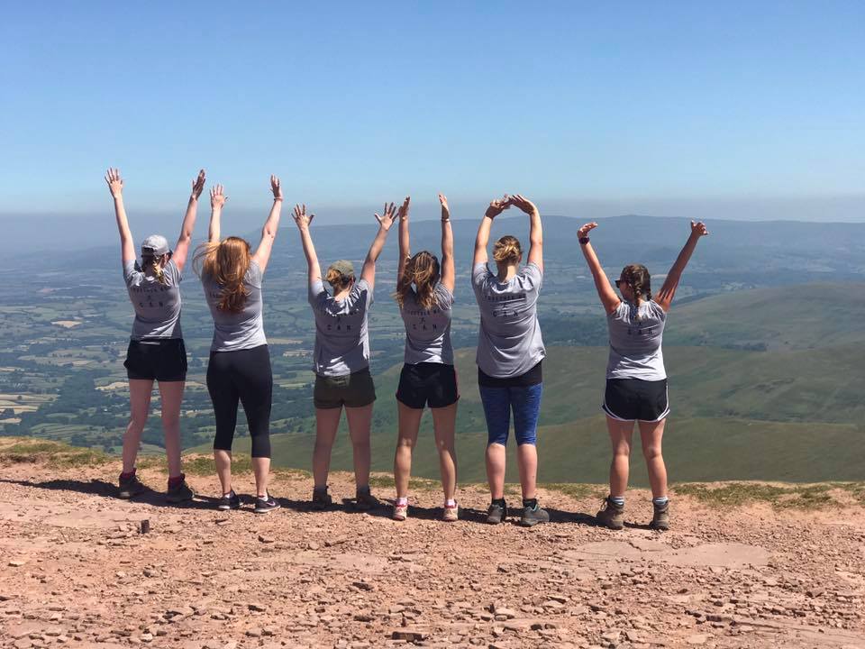 Forces Wives Challenge Team Holding Hands High