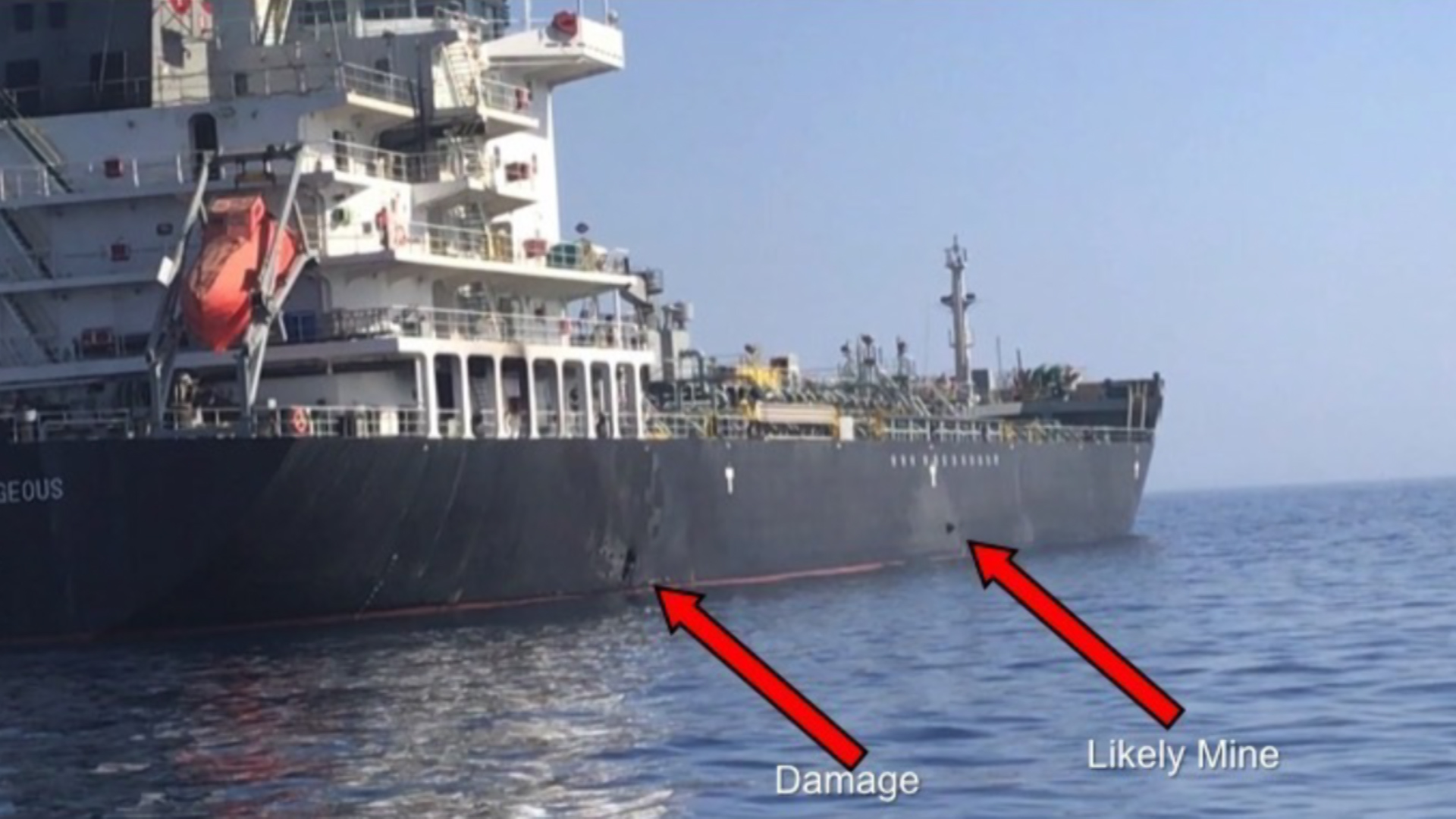 Photograph taken by the US military shows damage to the Kokuka Courageous and a suspected limpet mine (Picture: US Department of Defense). 