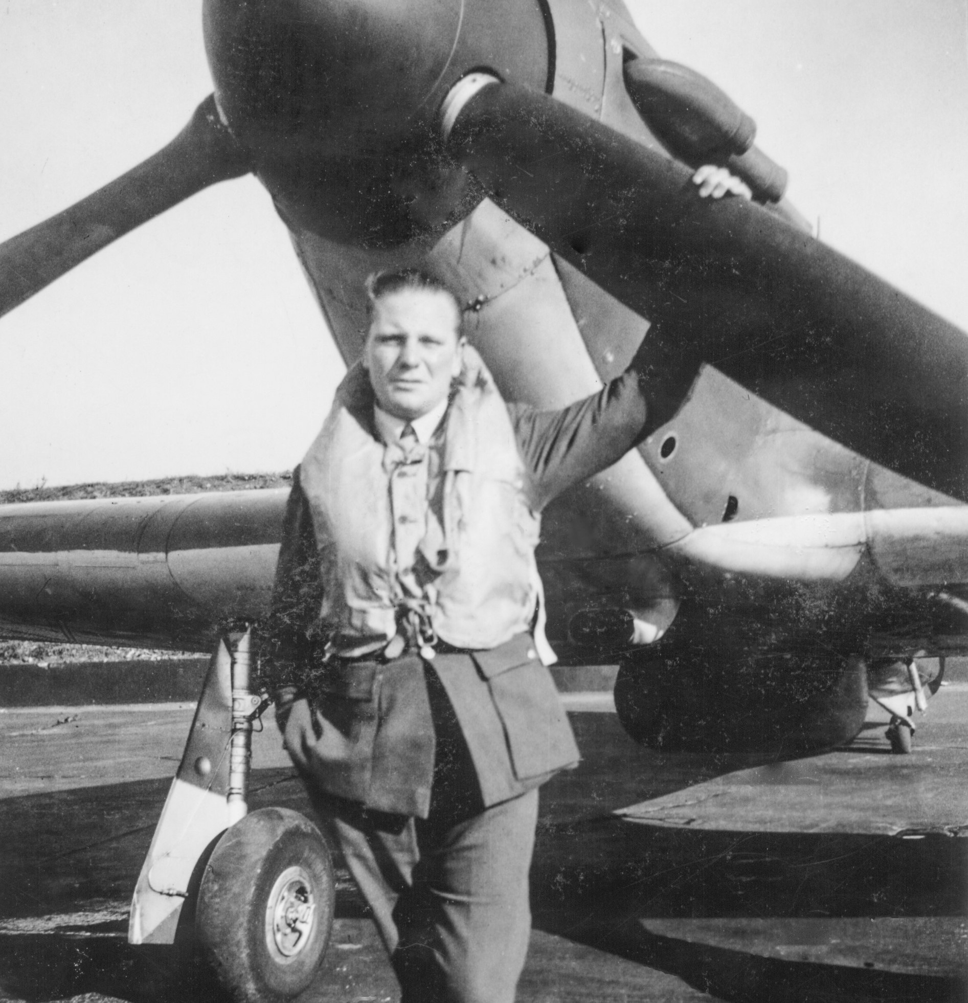 Pilot Officer (later Group Captain) Ronald N H Courtney standing in front of a Hawker Hurricane at RAF North Weald in August 1940 during the Battle of Britain where he was part of 151 Squadron (Picture: Courtesy of the Courtney family).