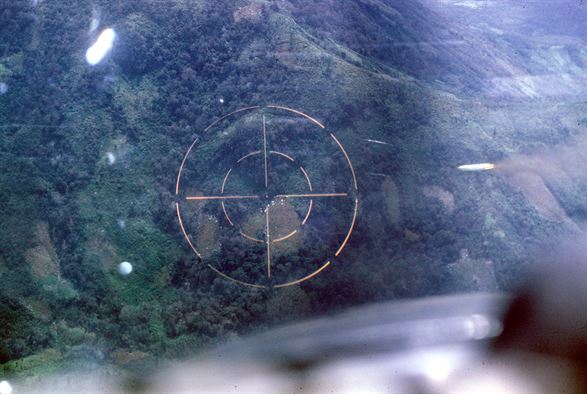 Pilot's view of marking a target with white phosphorus rockets. U.S. Air Force FACs found and marked targets on the Ho Chi Minh Trail