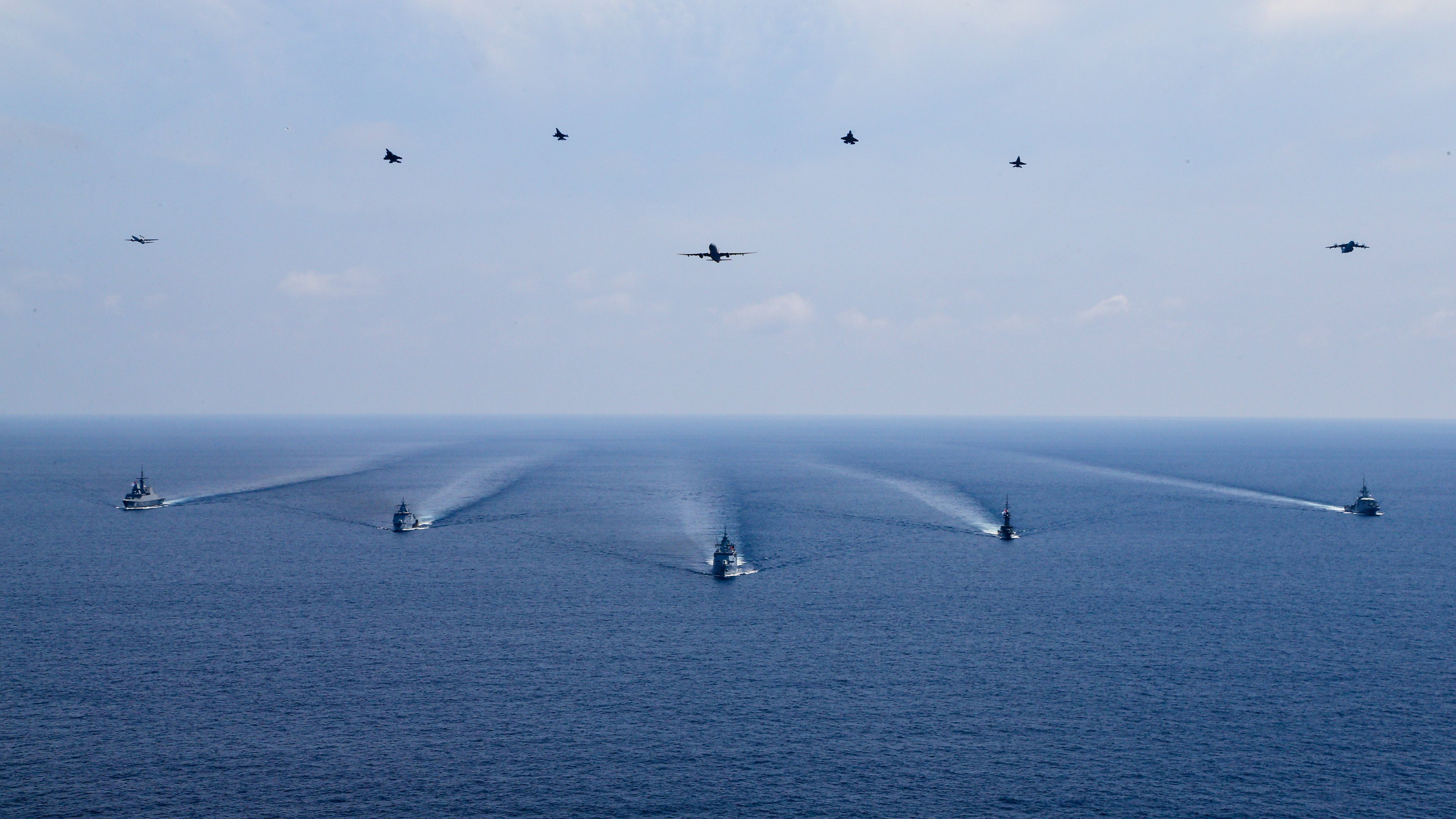 Planes and ships at Bersama Lima.