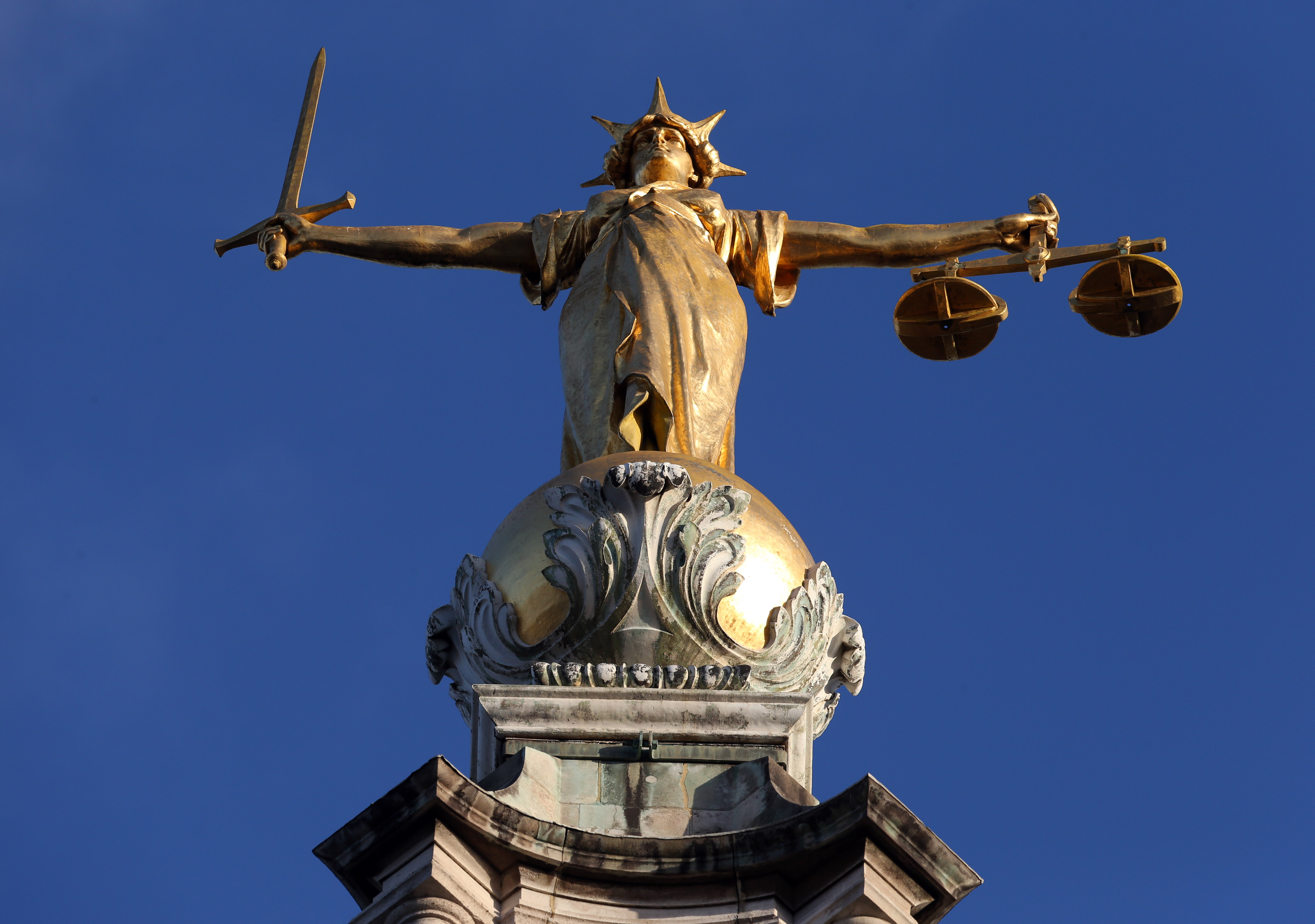 Pomeroy's Statue of Justice stands atop the Central Criminal Court building, Old Bailey, London