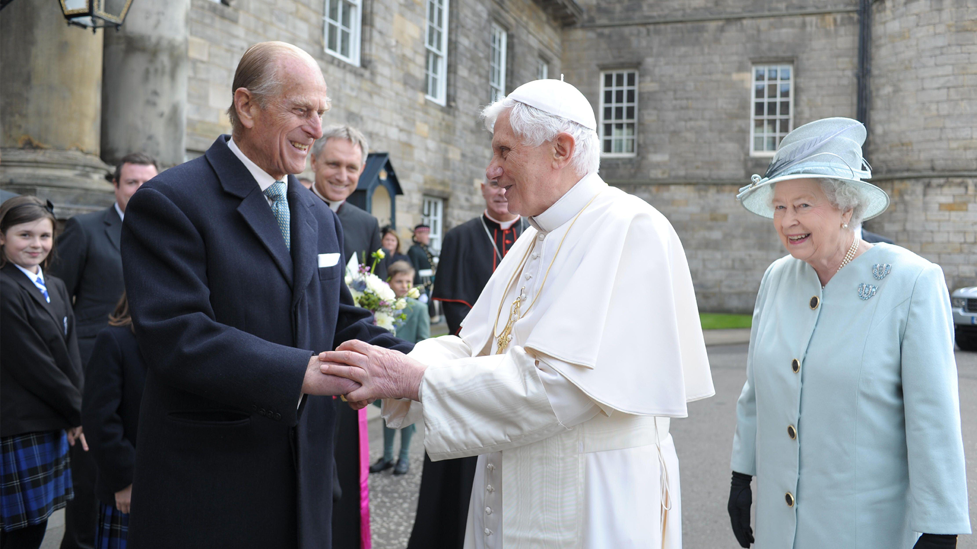 Pope Benedict XVI (C) is greeted by Britain's Prince Philip (L) and Queen Elizabeth at the Palace of Holyroodhouse (Picture: Independent Photo Agency Srl/Alamy)