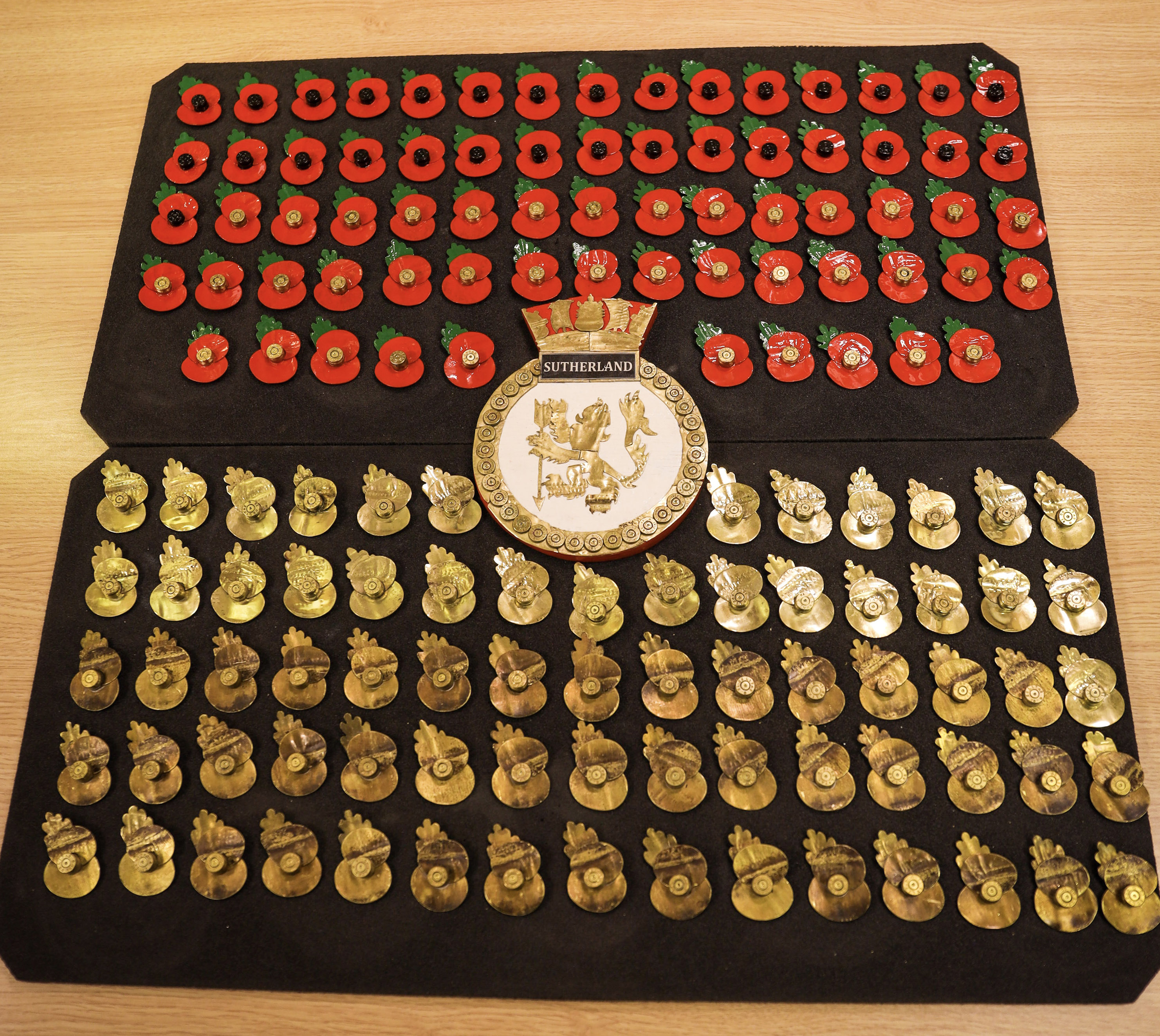 Each poppy takes 20-30 minutes to hand cut, file and assemble with the option of four different finishes (Picture: Royal Navy).