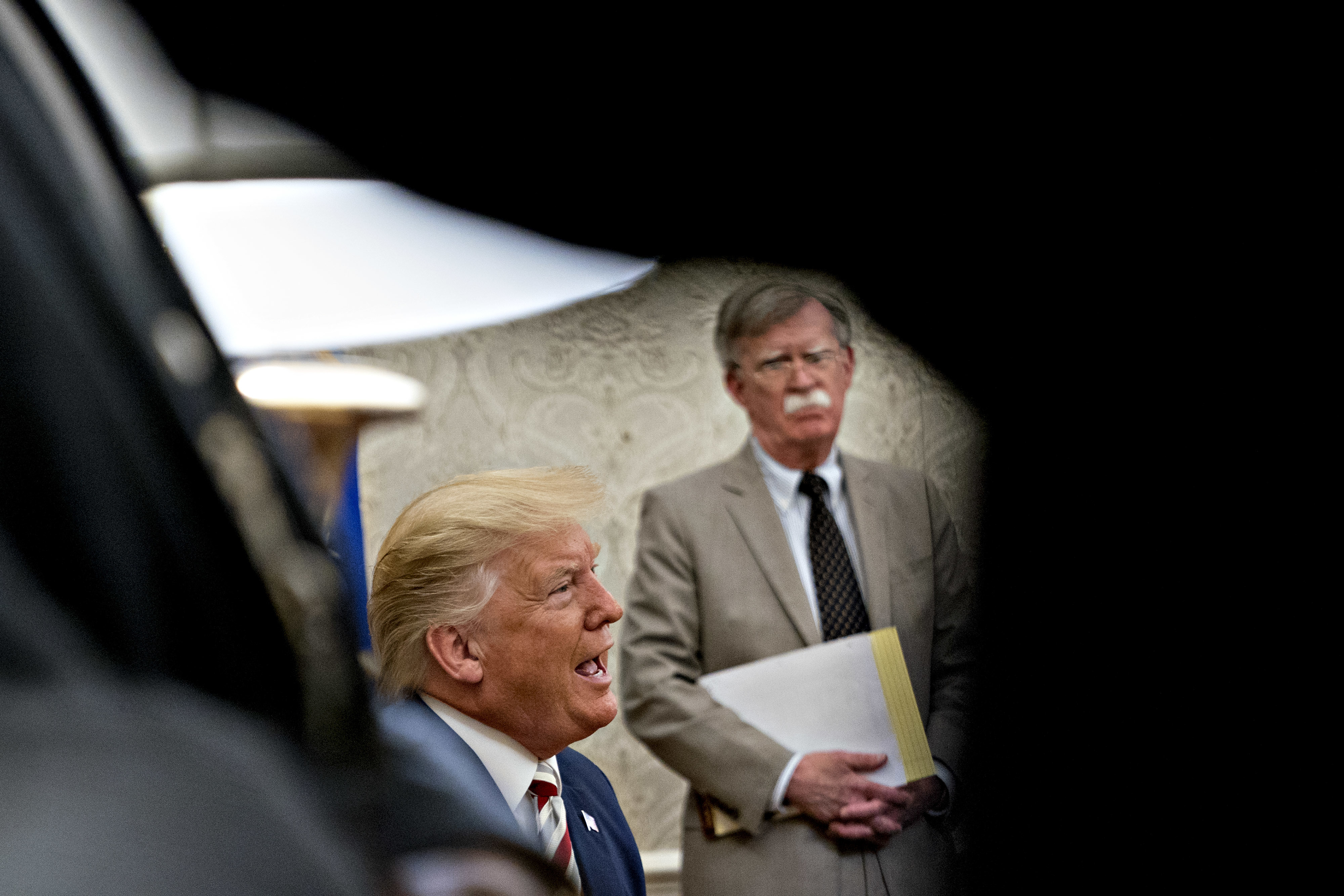President Donald Trump and US National Security Advisor John Bolton 200819 CREDIT PA