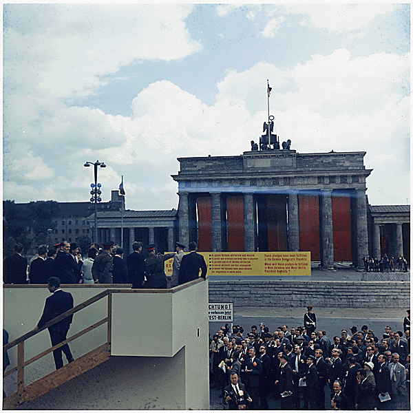 President Kennedy at Berlin Wall Brandenburg Gate, West Germany in 1963 SOURCE pingnews Public domain