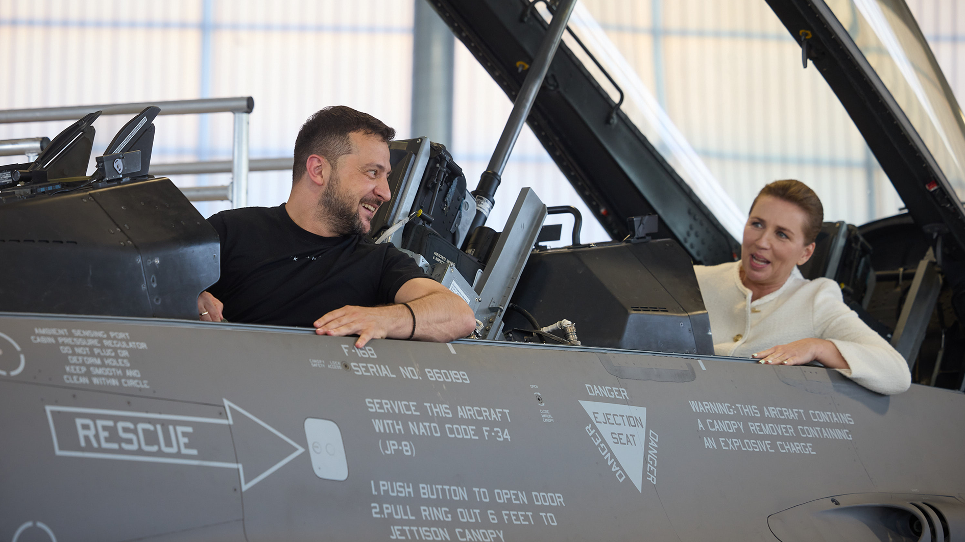 Volodymyr Zelensky and Prime Minister of Denmark Mette Frederiksen on board an F-16B during a visit to Fighter Wing Skrydstrup air base of the Royal Danish Air Force (Picture: Alamy).