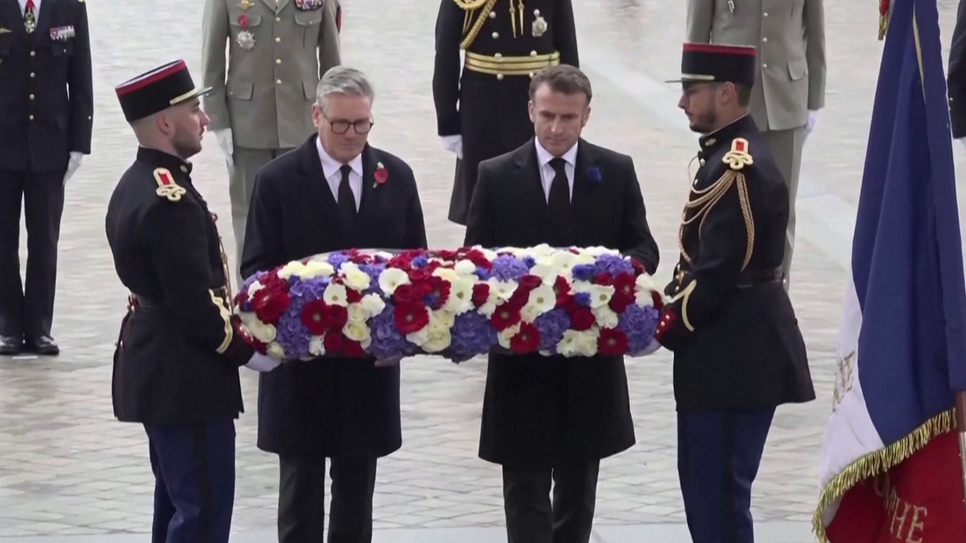 Prime Minister Keir Starmer and French President Emmanuel Macron lay wreath at Tomb of the Unknown Soldier Arc de Triomphe 111124 CREDIT REUTERS.jpg
