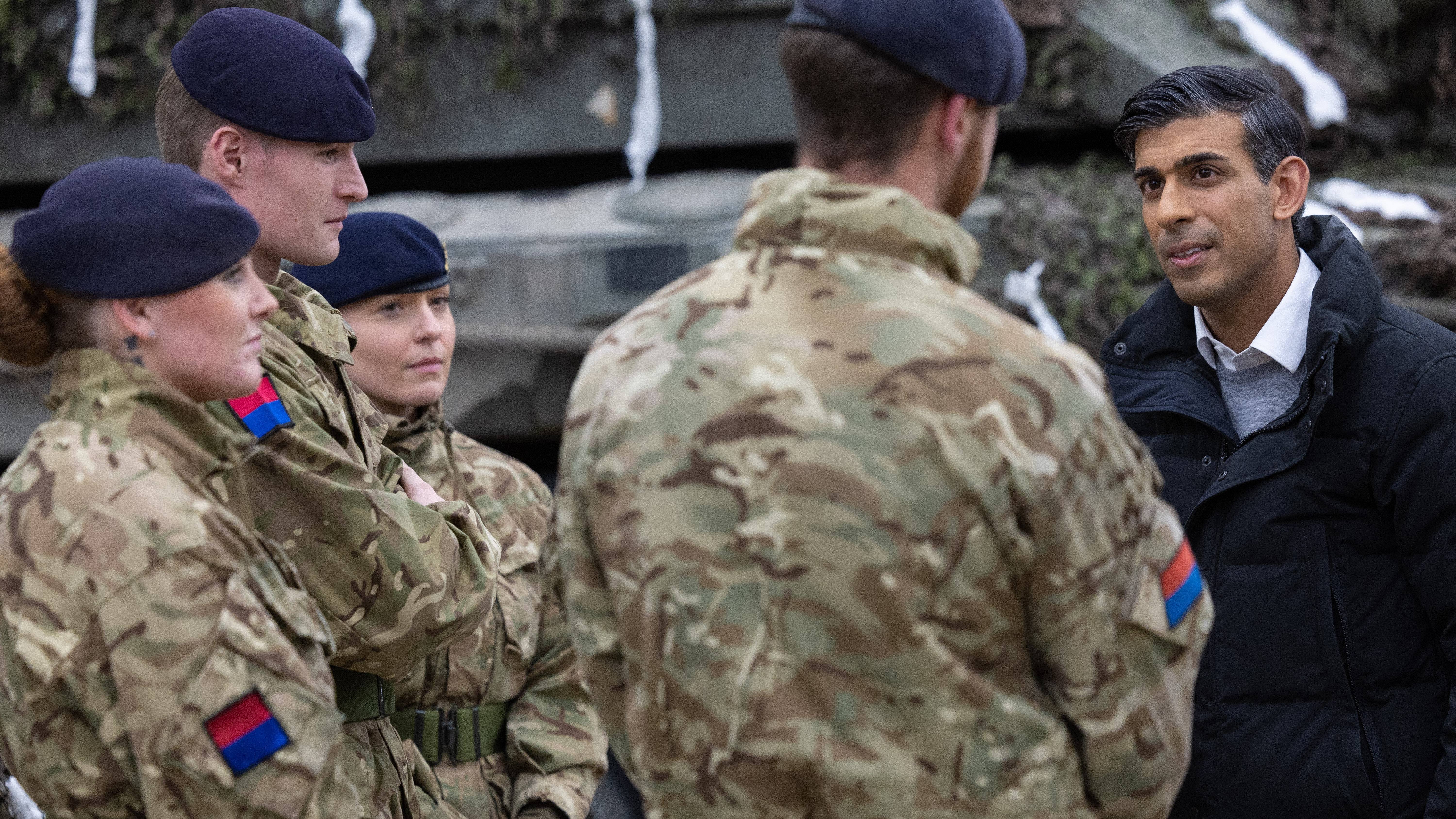 Rishi Sunak, pictured here meeting British troops in Estonia last year, has thanked troops on Armed Forces Day