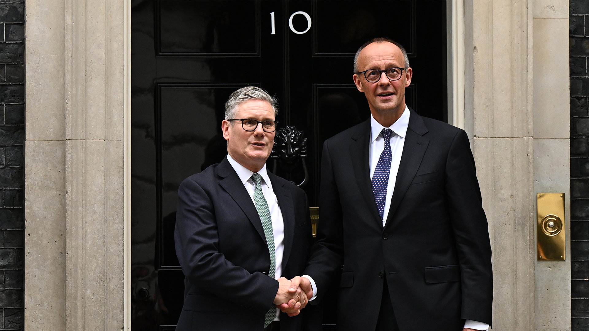 Prime Minister Sir Keir Starmer welcomes German Chancellor Friedrich Merz on the steps of 10 Downing Street 