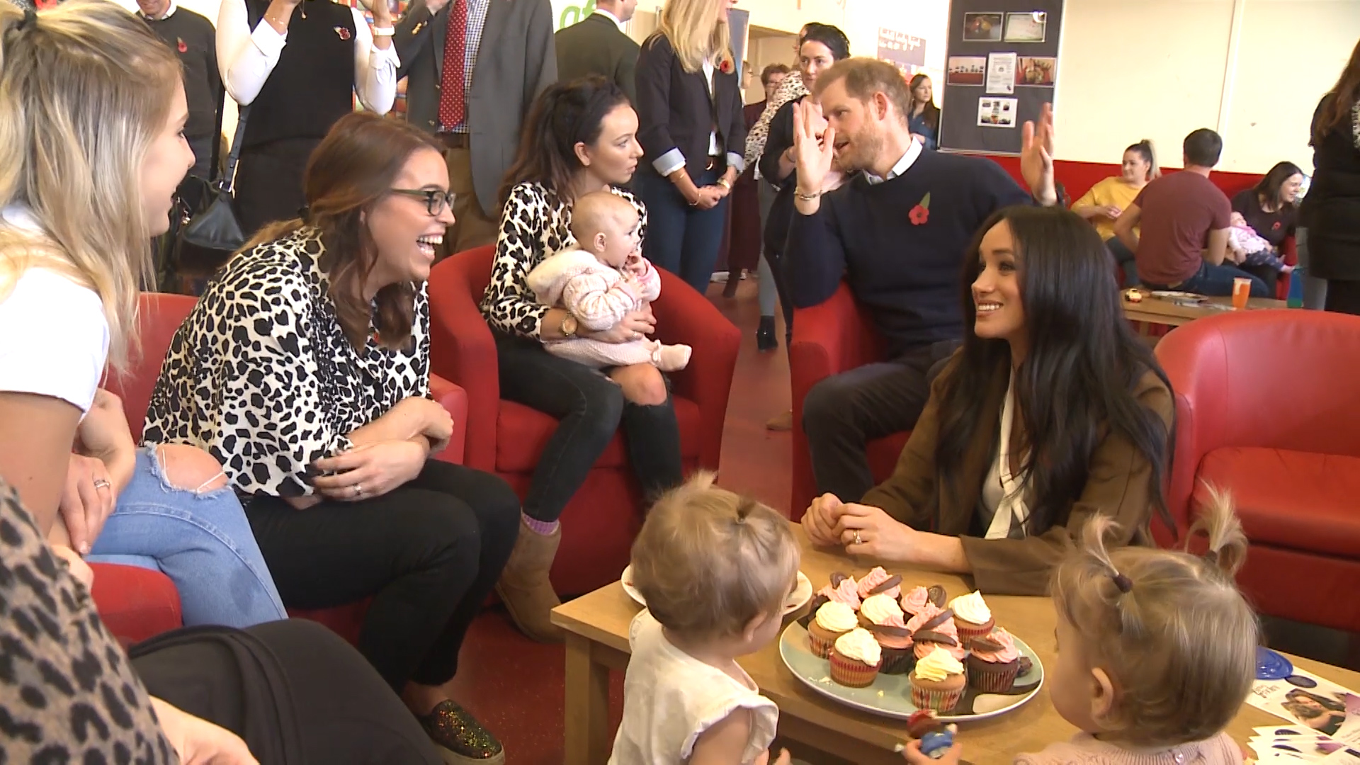 Prince Harry and Meghan chat to service families.