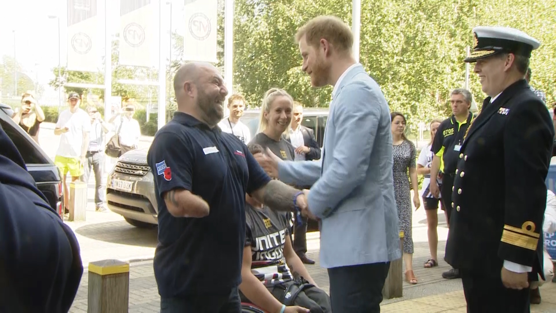 Prince Harry speaks to Invictus Ambassador, David Watson.