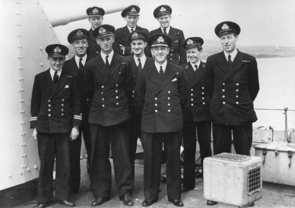 Prince Philip with the crew of HMS Whelp - the ship from which he saw Japan's surrender in 1945 (Picture: Crown Copyright).