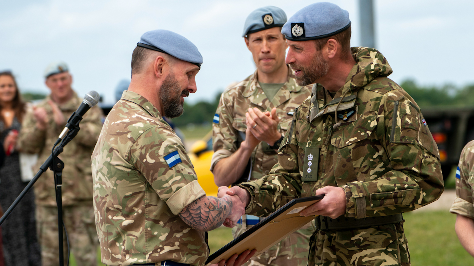 Captain Kenny Copeland is awarded the King's Commendation by Prince William
