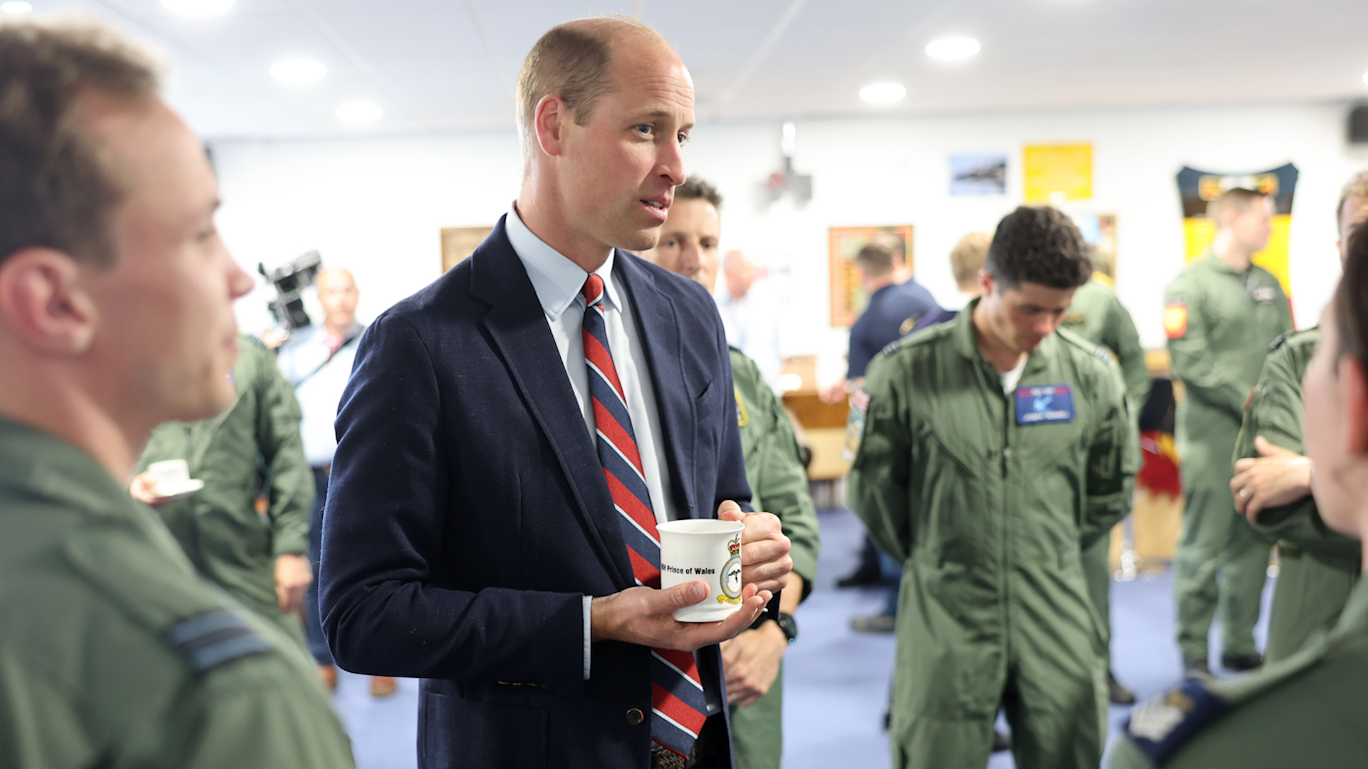 Prince William, with special mug, talks to RAF personnel during a visit to the RAF Valley 09072024 NO REUSE CREDIT PA WIRE, PA IMAGES