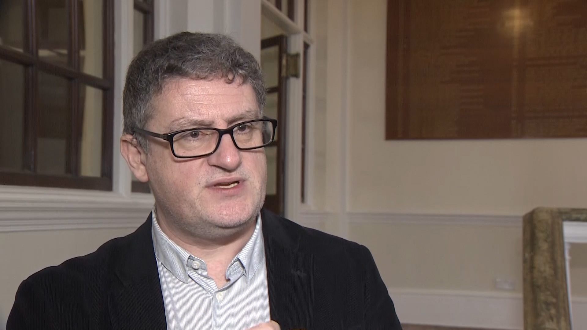 Prof Mark Galeotti speaking at RUSI 200219 CREDIT BFBS.jpg 
