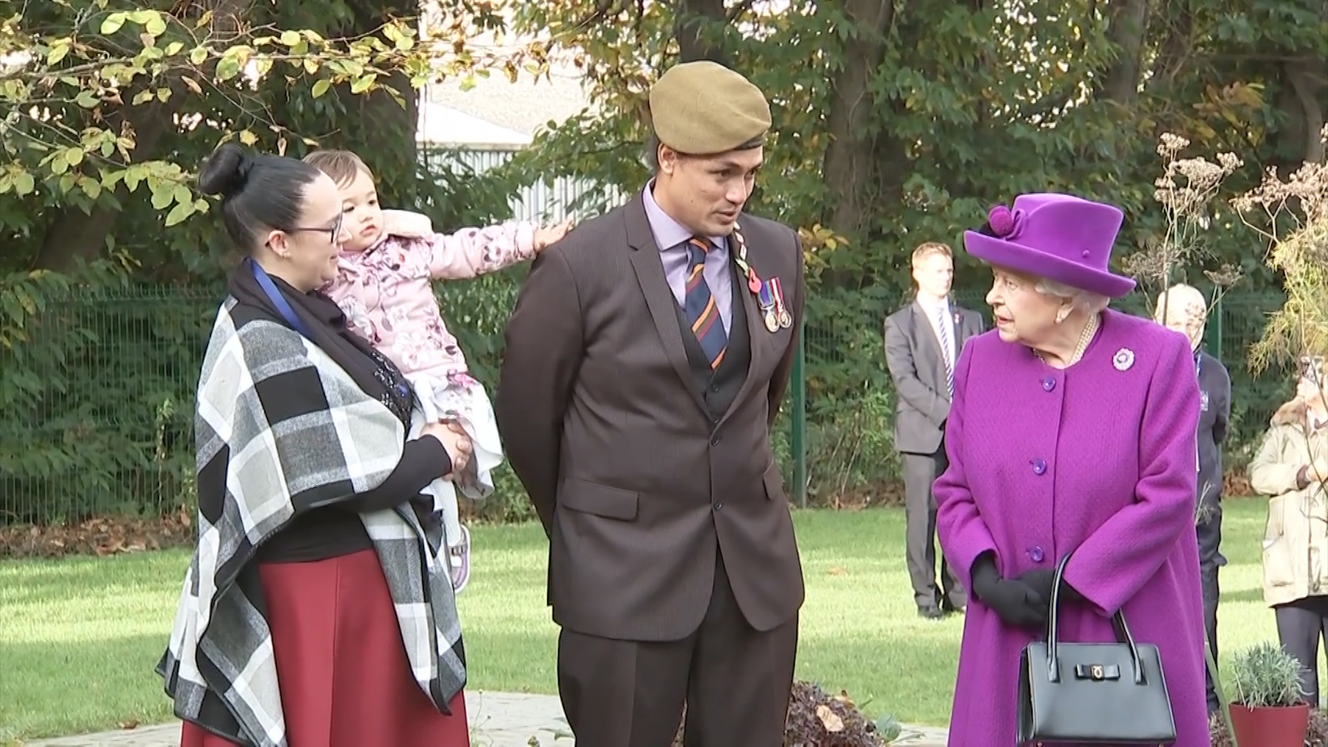 John Ahben showed the Queen his work in the garden.