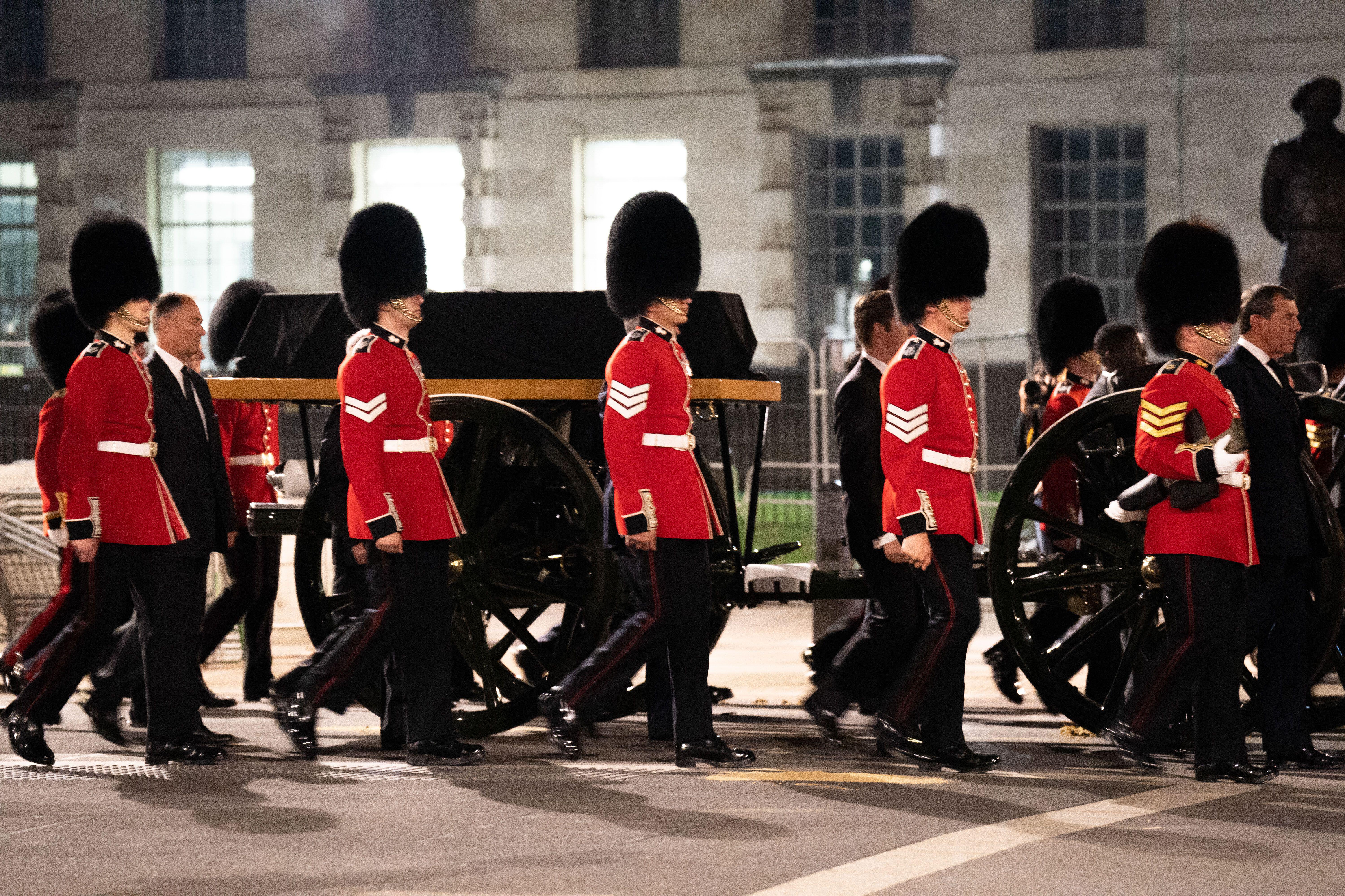 An early morning rehearsal for the procession of Queen Elizabeth's coffin from Buckingham Palace to Westmister Hall, London, September 13 2022 (Picture: PA Images / Alamy).