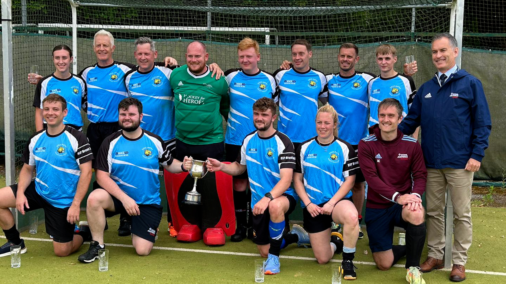 RAF Brize Norton pose with the trophy after winning hockey's Tri Service Cup