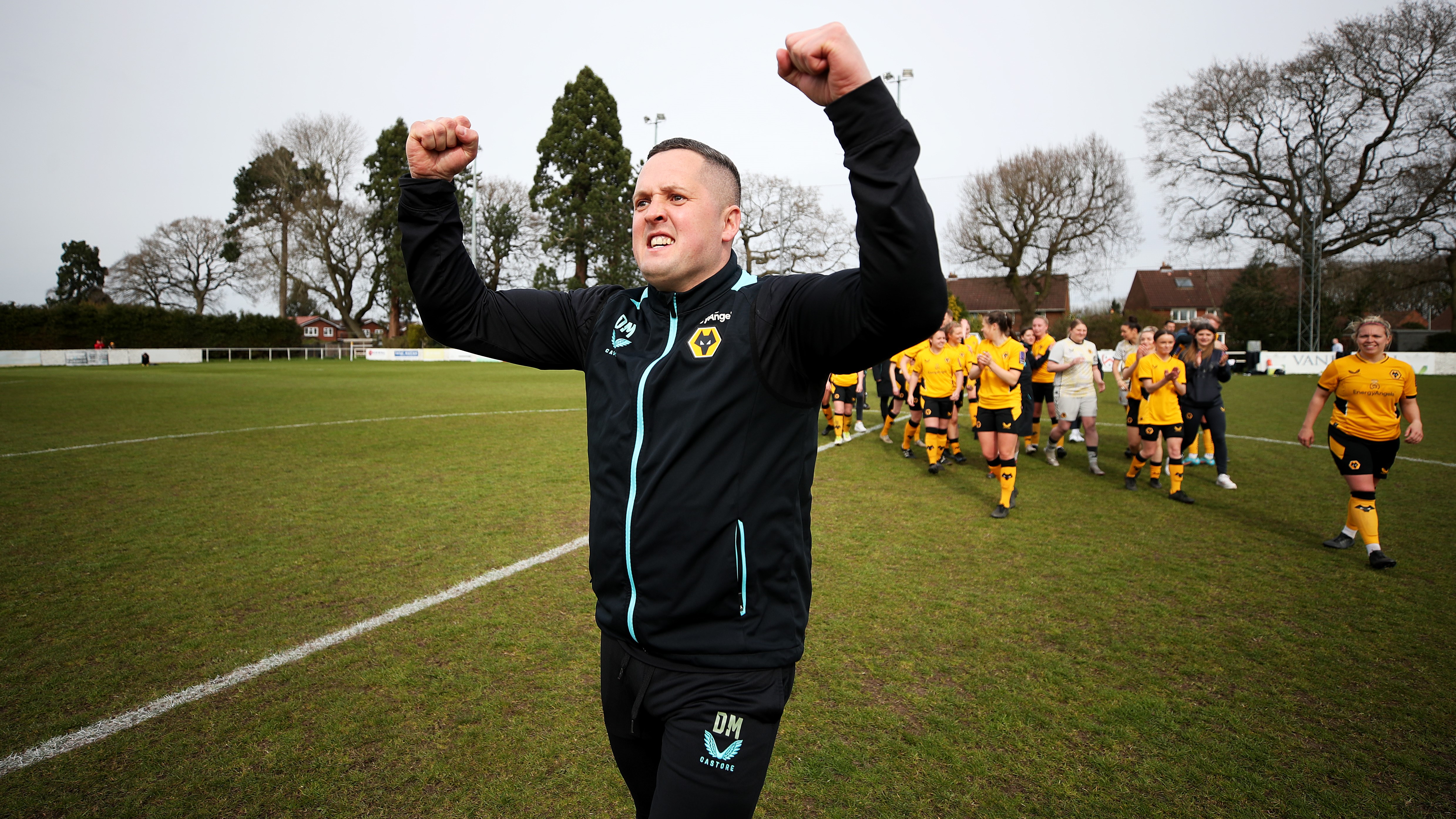 RAF Cpl Dan McNamara and Wolves women's football team manager celebrated title win DATE 11042022 CREDIT Wolves Womens Football Club.jpg