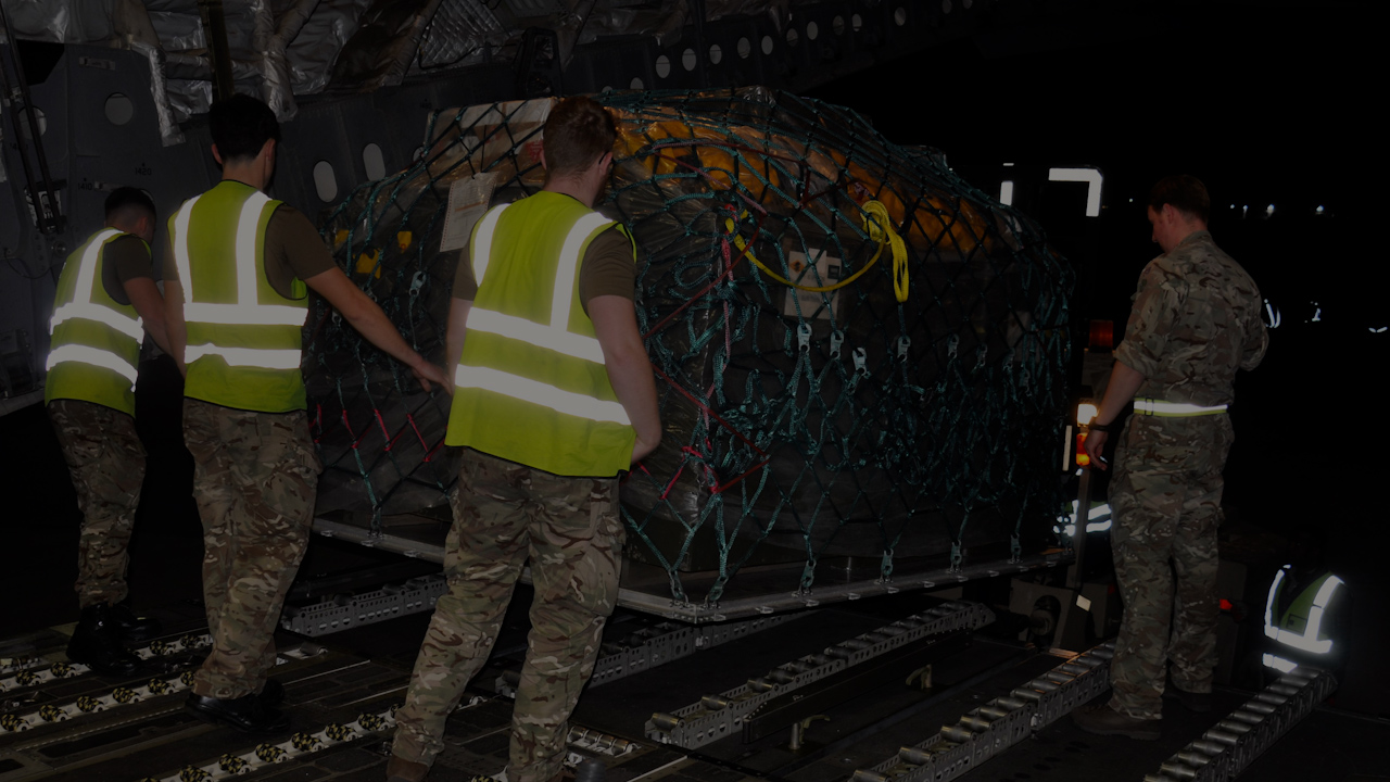 Royal Air Force personnel from 99 Squadron unloading equipment from their aircraft (Picture: Royal Air Force).