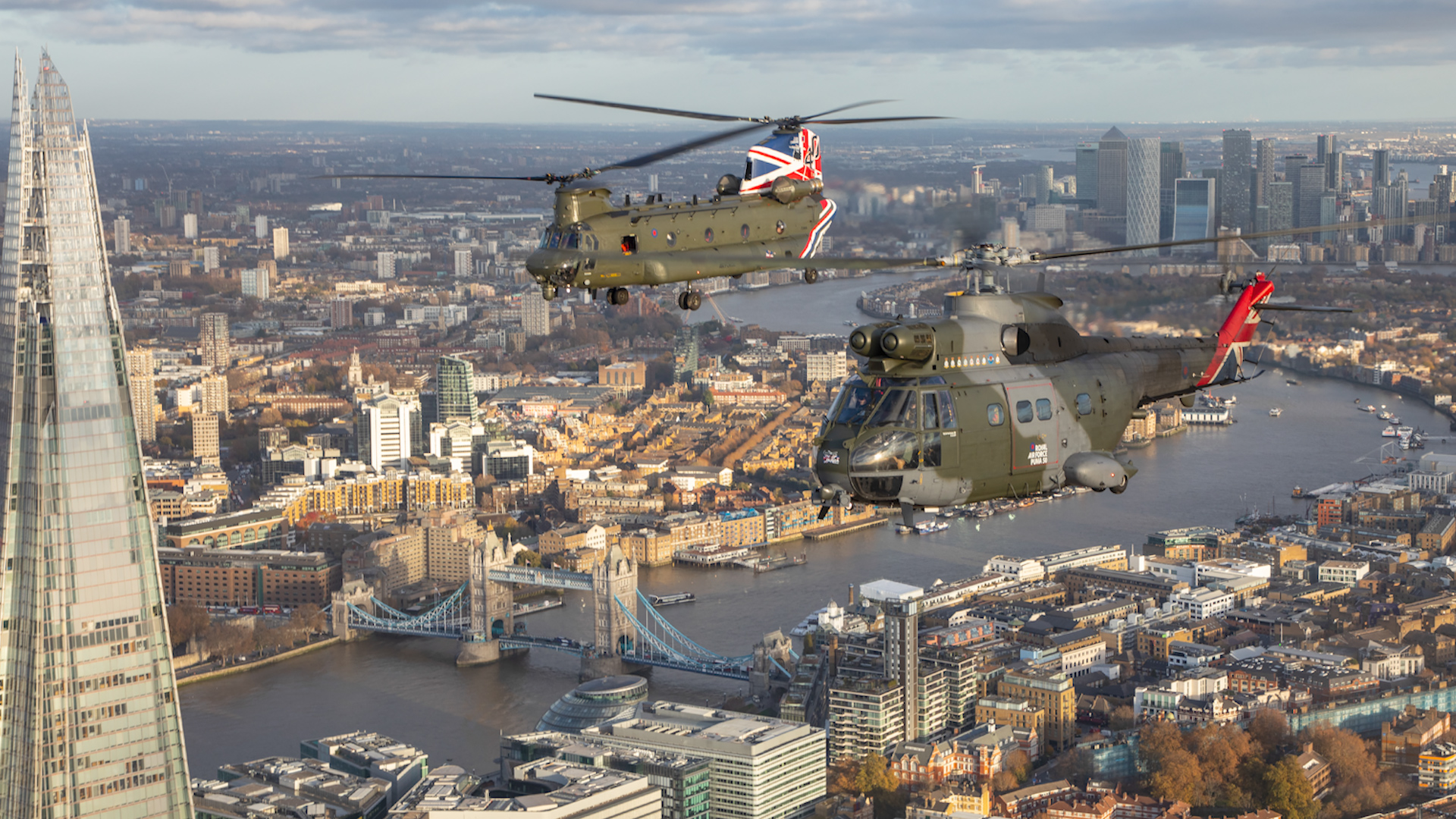 RAF Puma and Chinook helicopters flying over London to celebrate 90 years of combined service