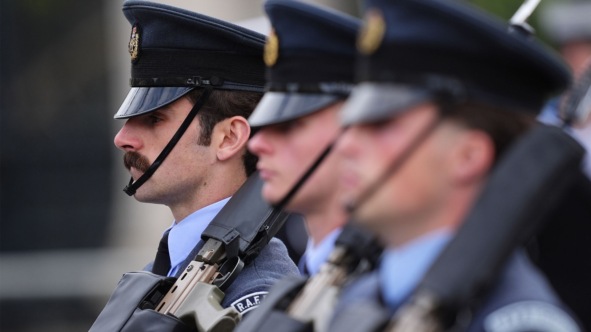 Gunners from the RAF Regiment march with their SA80 rifles shouldered during the parade