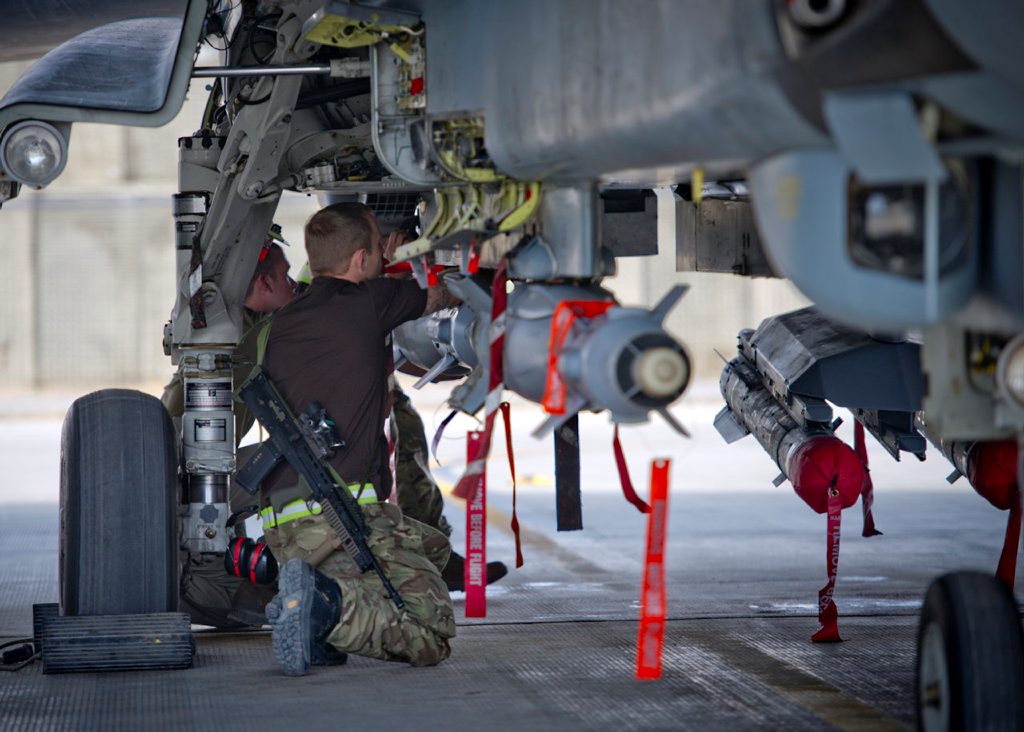 RAF armourers working on a Paveway guided bomb - Anonymous 160513 CREDIT MOD
