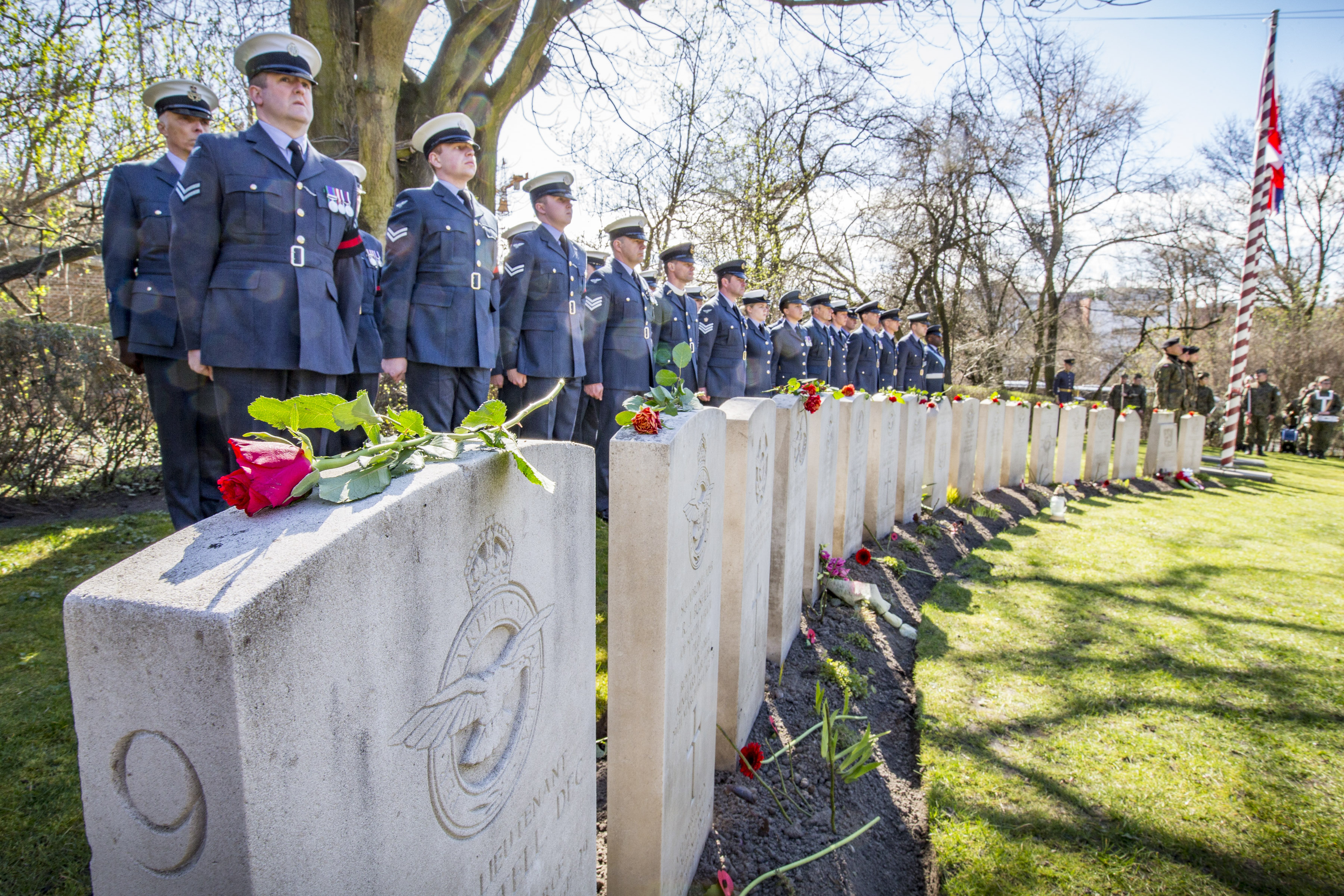 RAF personnel parade at the Old Garrison Cemetery in Poznan where 48 escapees are buried (Picture: MOD).