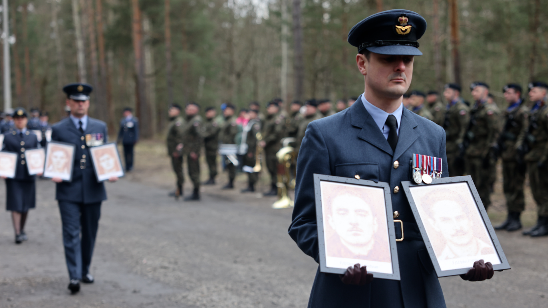 The portraits of those executed by the Gestapo were carried by current serving members of the RAF