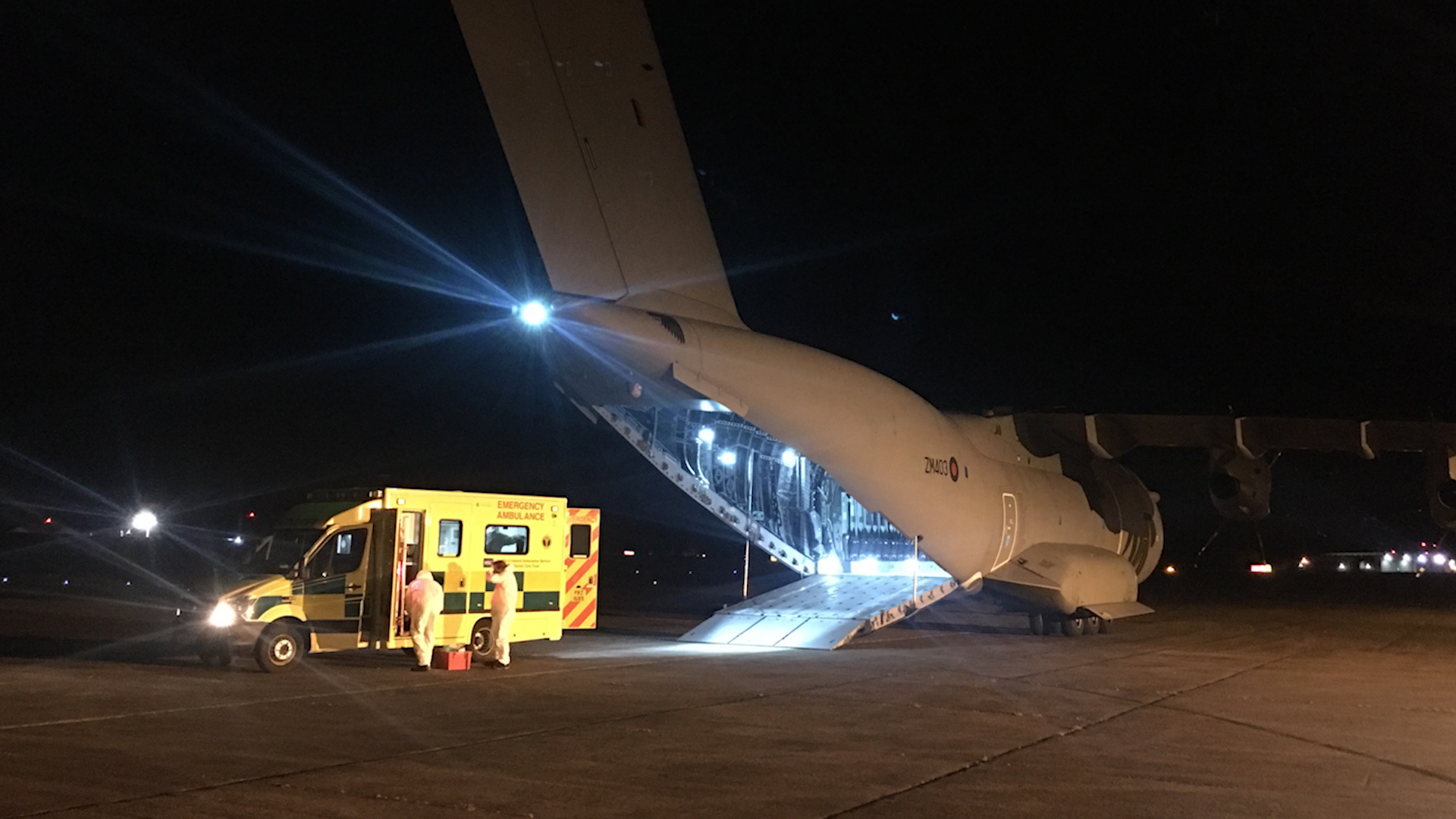 RAF working with health workers to transport the patient (Picture: ArmedForcesNI/ Twitter).
