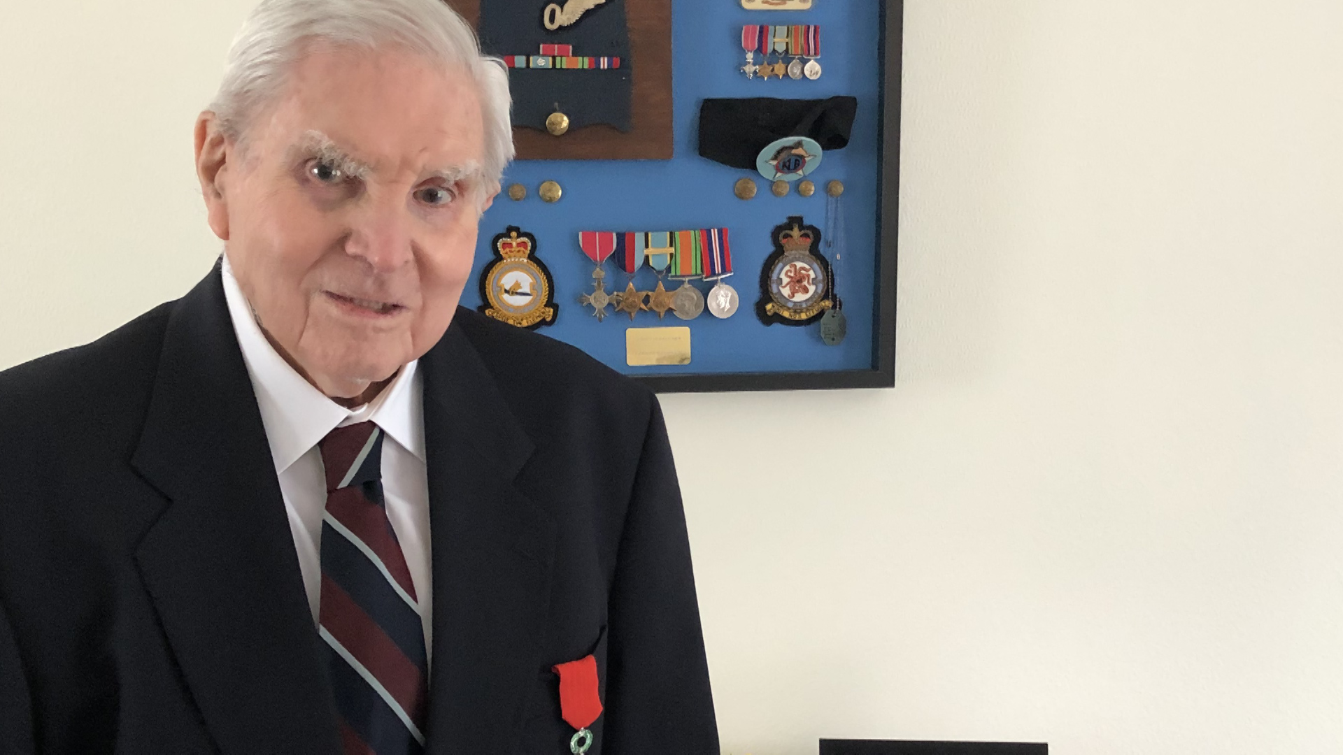 Cover image: Mr Booker with the Legion D'Honneur (Picture: SSAFA).