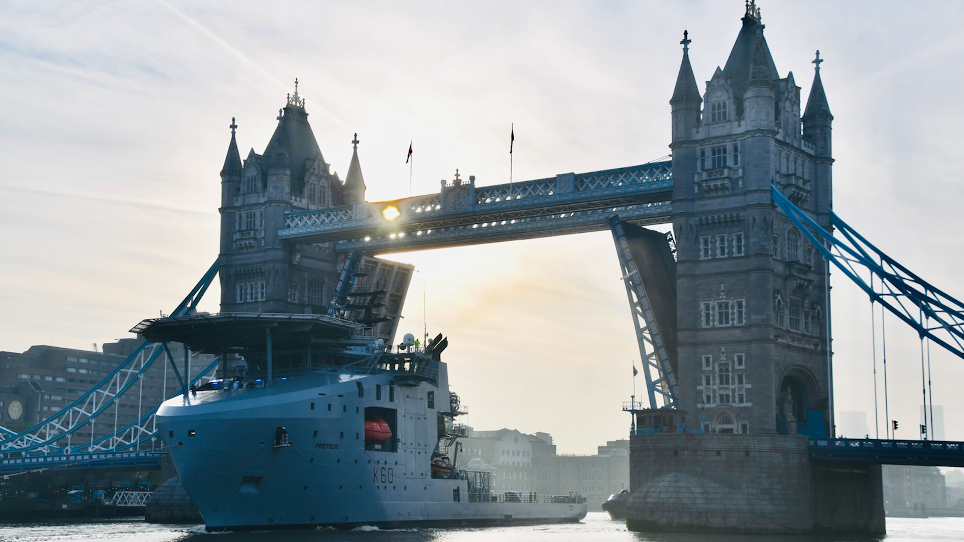 RFA Proteus in London sailing under Tower Bridge