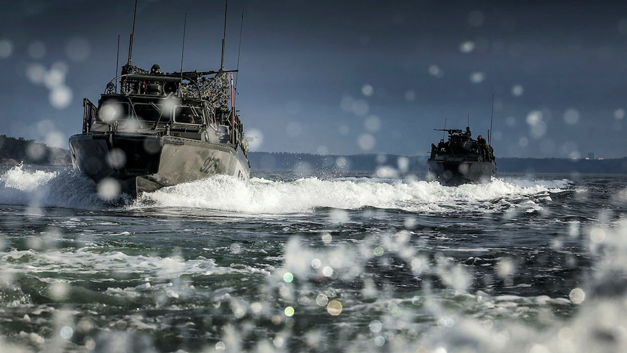 Royal Marines of 45 Commando and Swedish Coastal Rangers using a Stridsbåt 90 H (Combat Boat 90 Half – CB90H) fast military assault craft during a joint Swedish/UK exercise during raiding a small Swedish island (Picture: MOD)