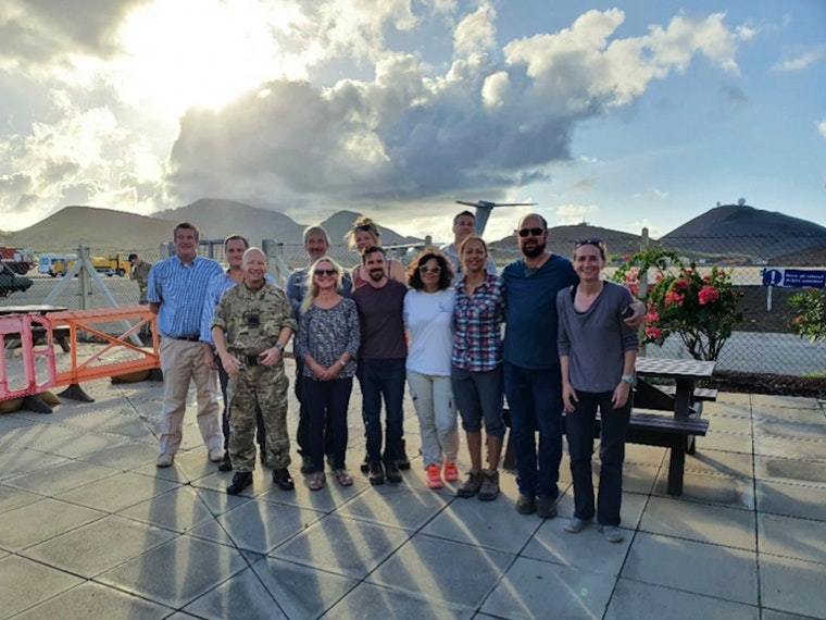 Cover image: The team of 12 was flown home by the RAF from Ascension Island (Picture: FCO).
