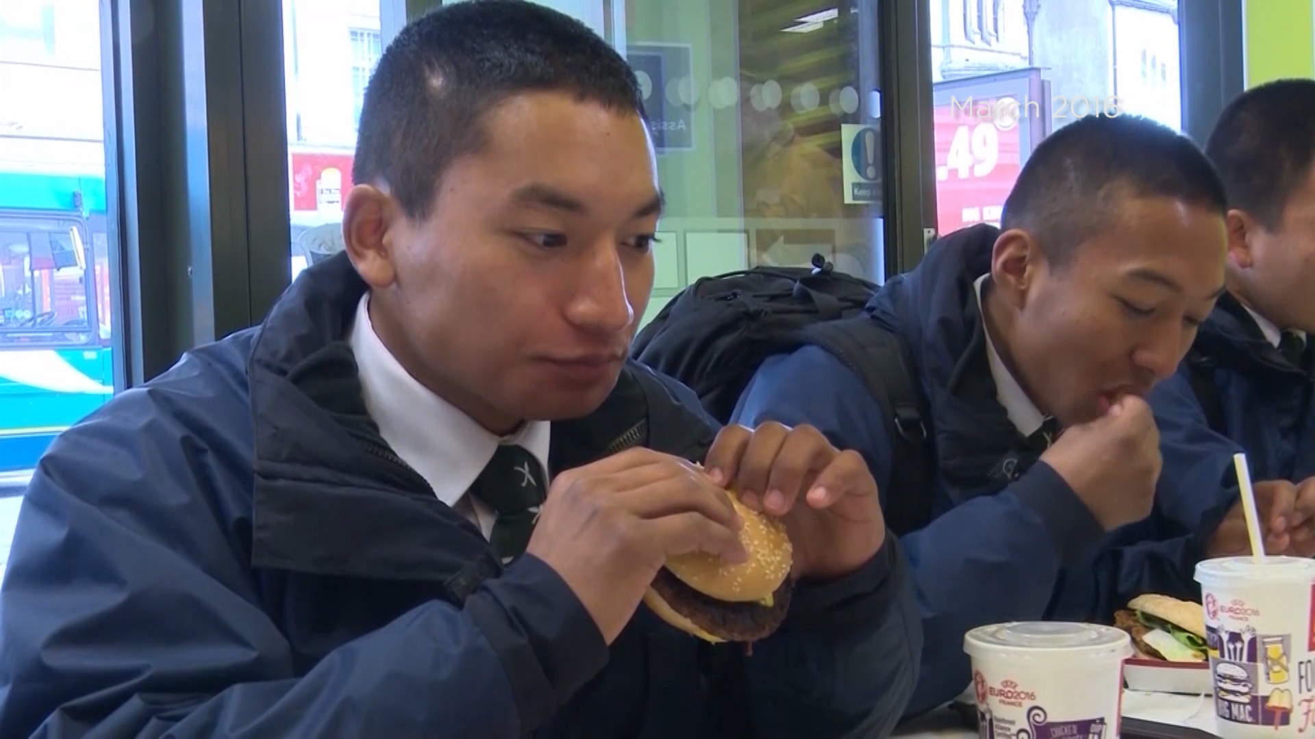 Rajan having his first burger in 2016.