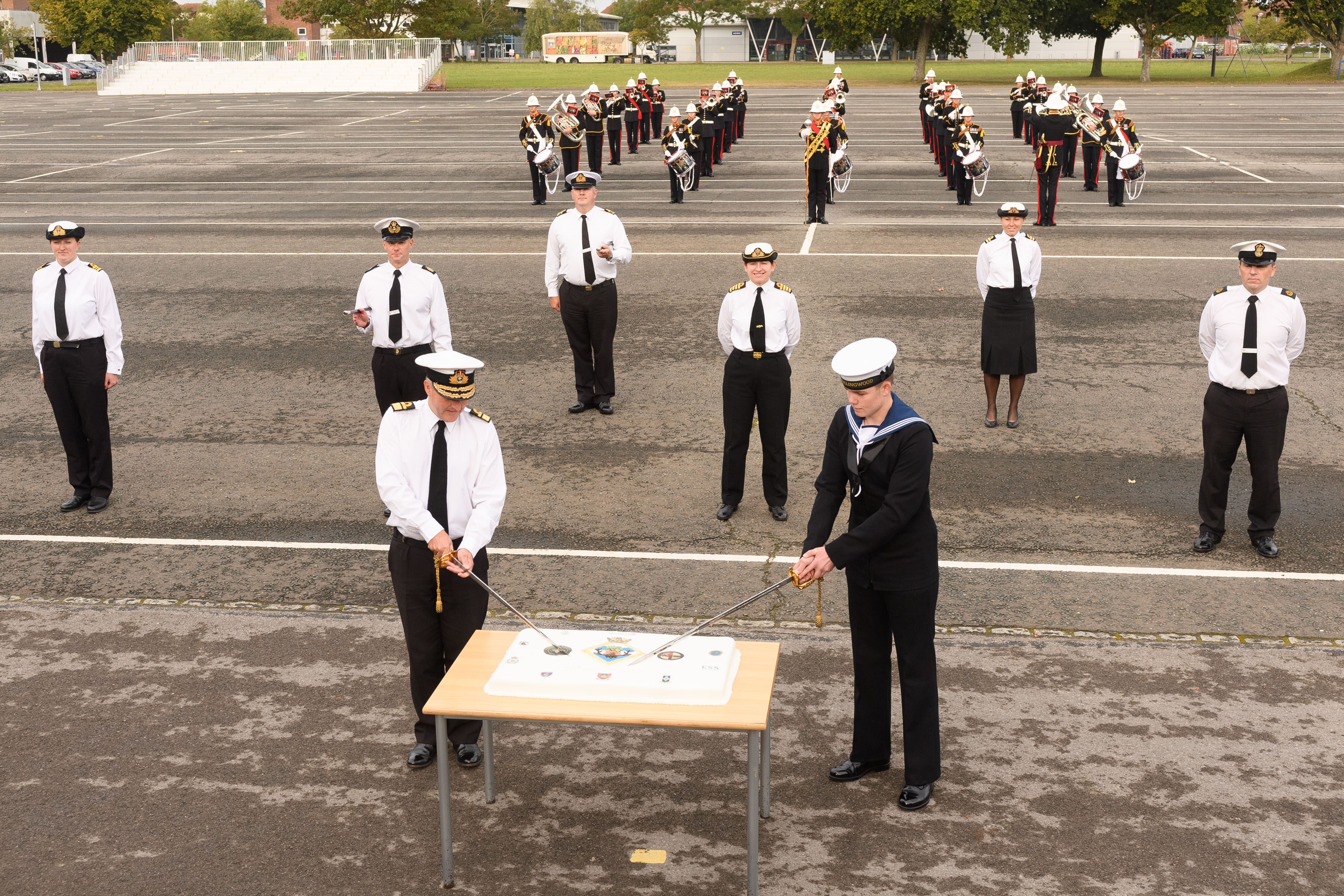 Cover image: Rear Admiral Phil Hally and Engineering Technician, Brendan Overal cutting the birthday cake at HMS Collingwood Picture: Crown Copyright). 