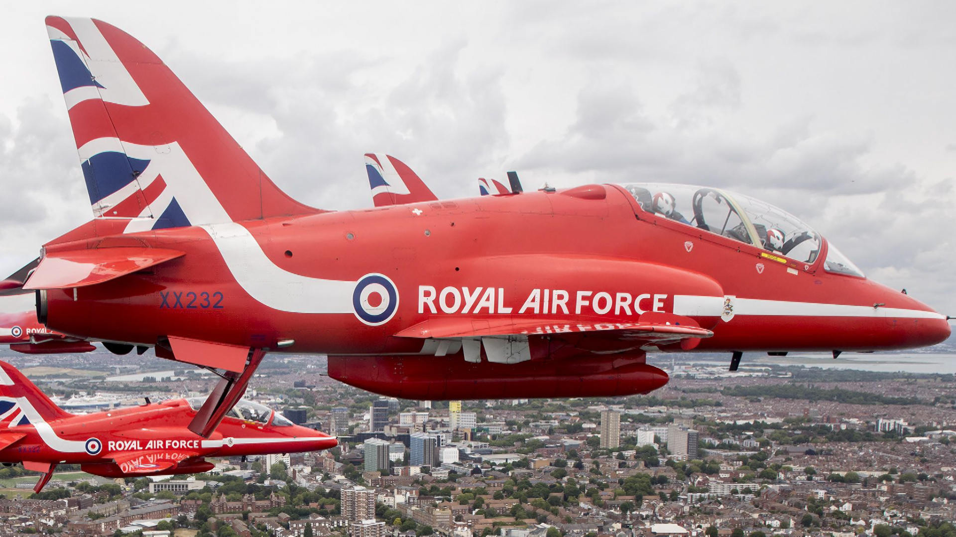 A flypast of 24 aircraft included the Red Arrows (Picture: MOD).
