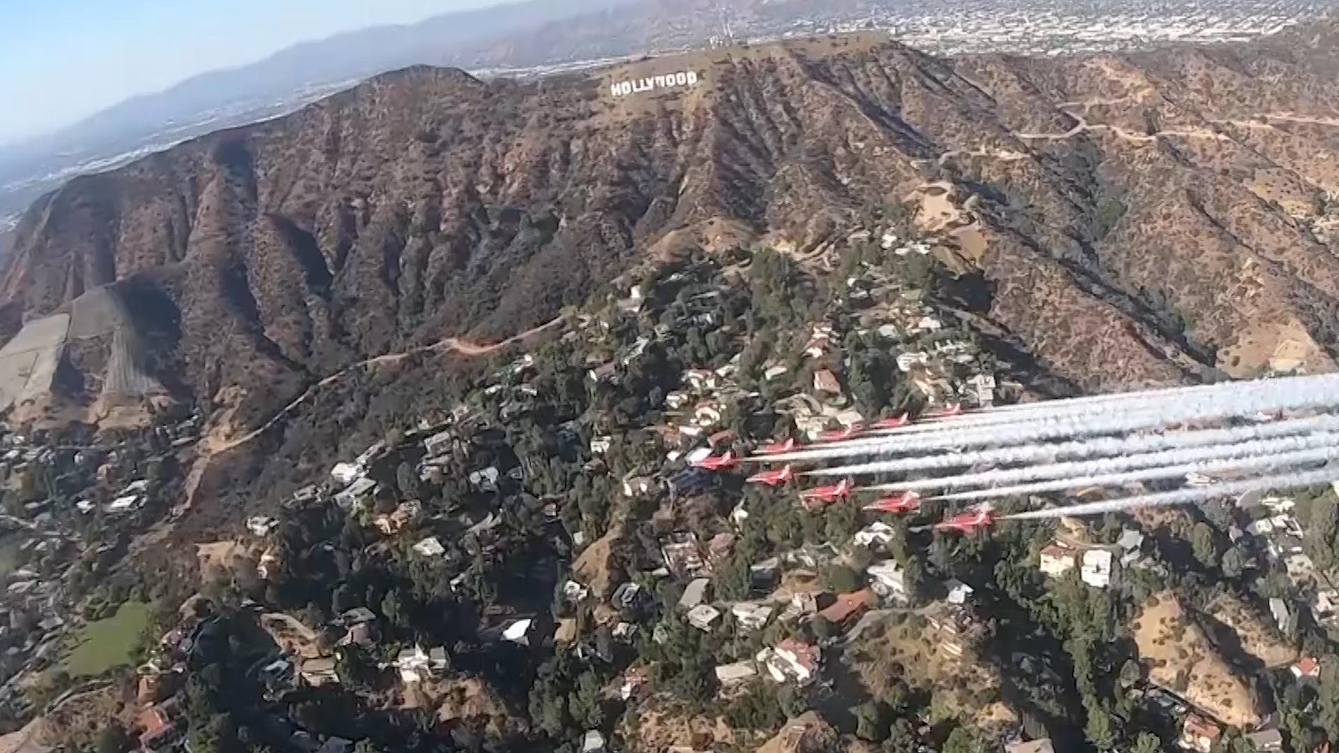 Red Arrows in formation by Hollywood sign, Los Angeles (Picture: Red Arrows).