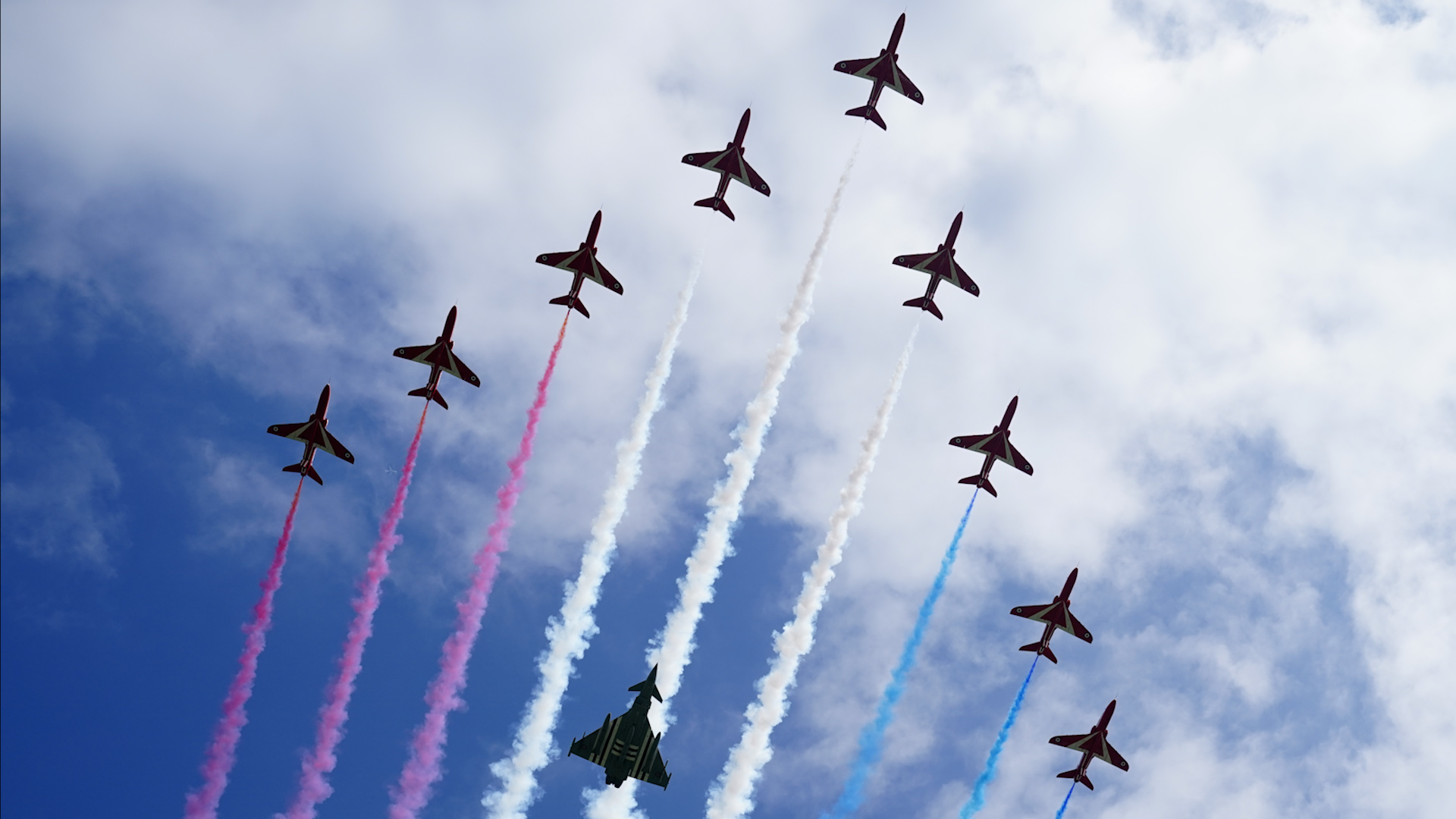 Red Arrows with Typhoon FGR4 aircraft flypast D Day 80 British Normandy Memorial in Ver-sur-Mer 060624 CREDIT PA