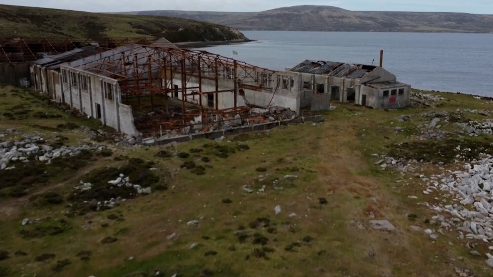 Red and Green Life Machine buildings screengrab from drone footage Falkland Islands conflict CREDIT BFBS
