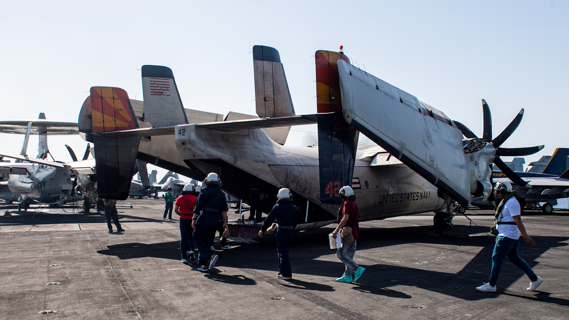 Rescued mariners board a C-2A Greyhound, attached to Fleet Logistics Support Squadron 16062024 CREDIT US Dept of Def