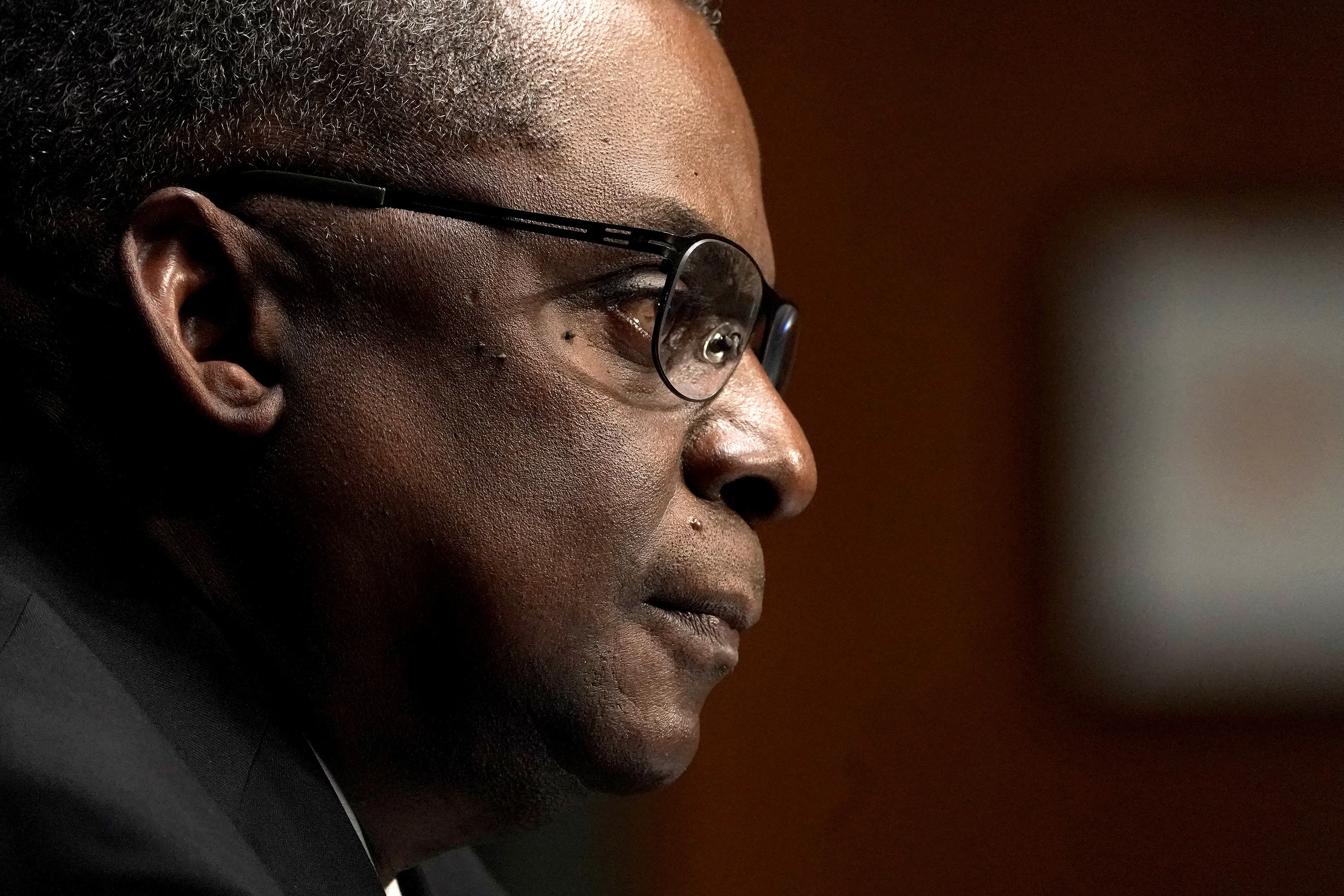 Retired US Army General Lloyd Austin, now US Defense Secretary, was present during the signing of Mr Biden's new order (Picture: PA).