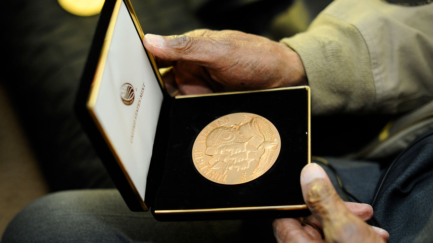 Retired Major George Boyd holds his Congressional Gold Medal in February 2016 CREDIT US Air Force