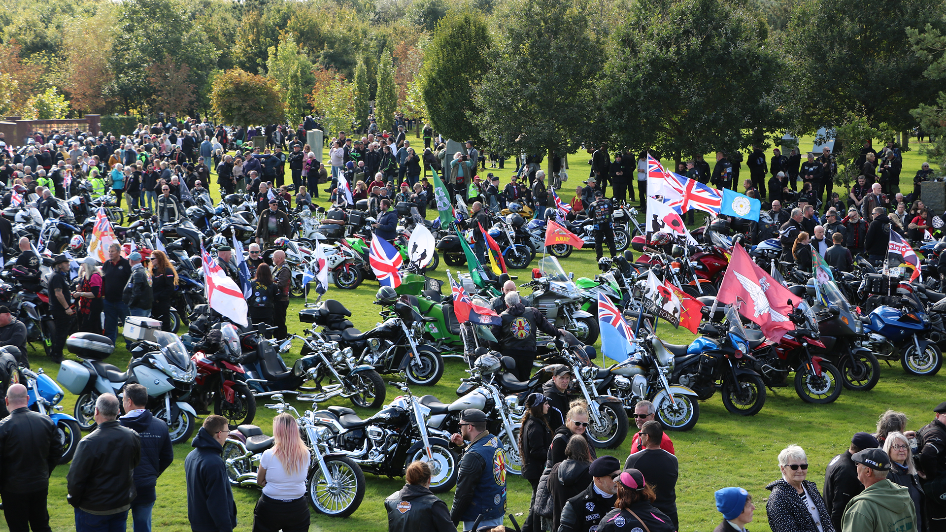 Thousands attended the Service of Remembrance in memory of the fallen UK Armed Service personnel whose names are engraved on the walls of the Armed Forces Memorial