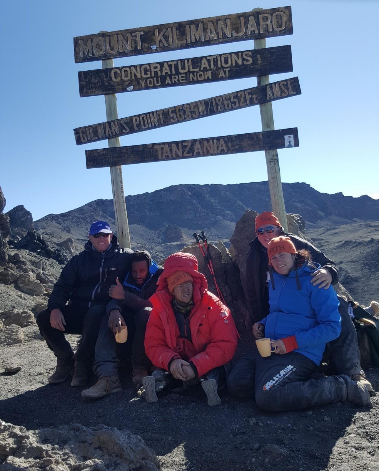James, Darren and the team upon completing their challenge (Picture: James Rose/Darren Young).