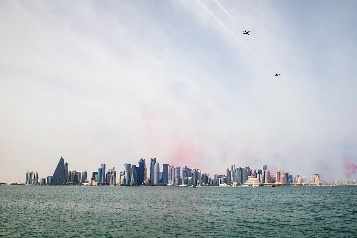 Royal Air Force Typhoons from 12 Squadron, RAF Coningsby & the Red Arrows take part in a flypast over Doha, Qatar