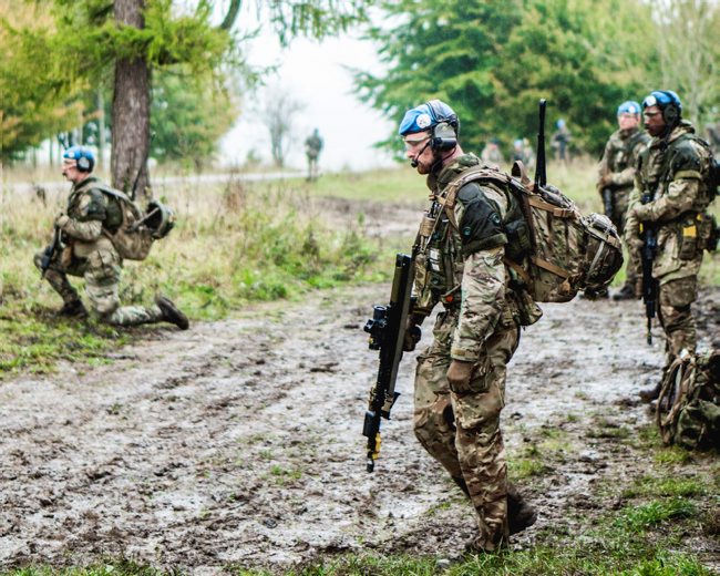 Cover image: Royal Anglian soldiers during the Mission Rehearsal Exercise (Picture: MOD).