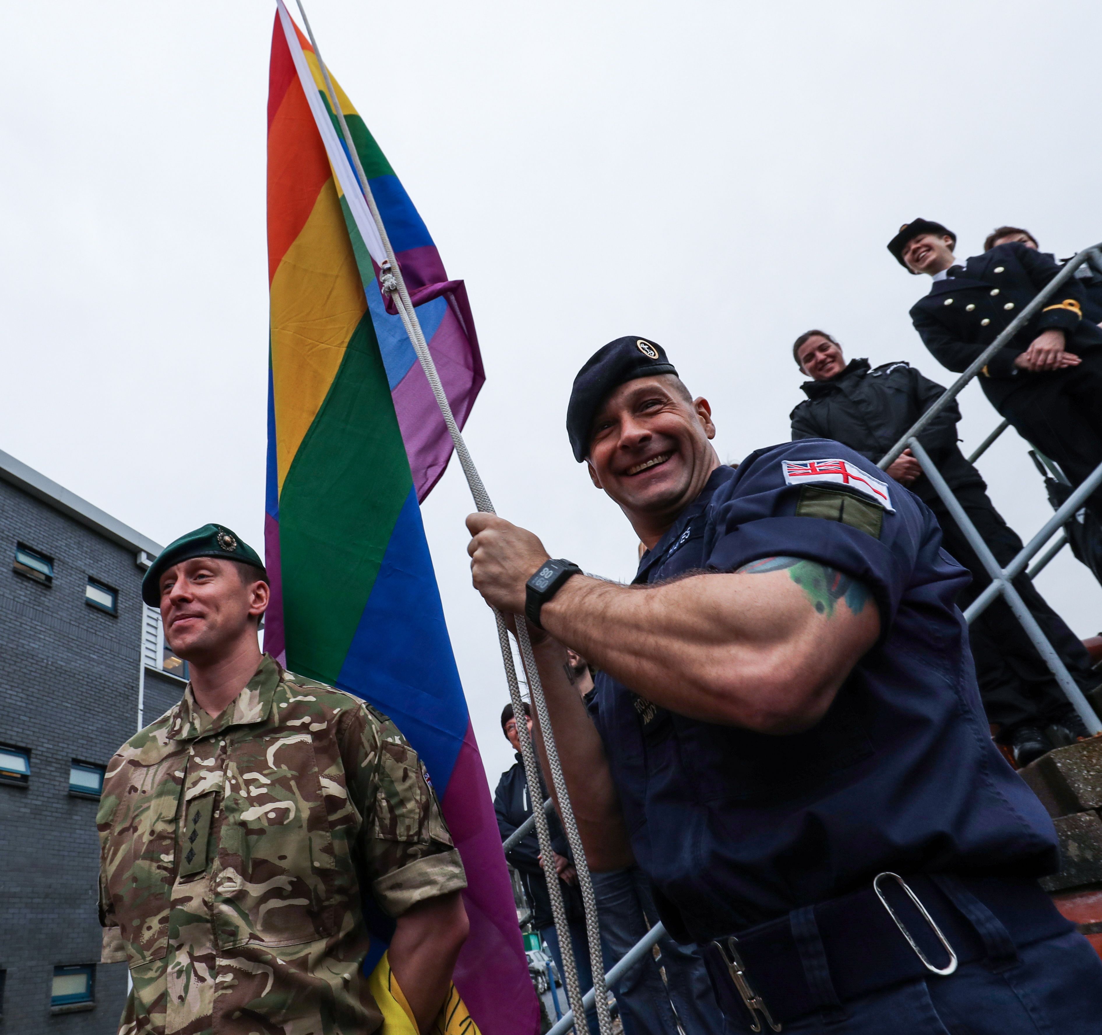 Royal Marine Captain hoists the Rainbow Flag at Faslane 220219 CREDIT Royal Navy.jpg 