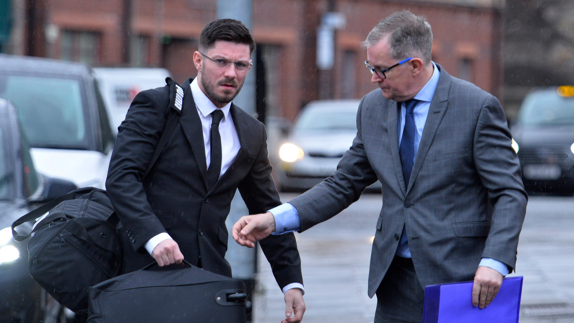 Royal Marine Commando Grant Broadfoot (l) and father Ian Broadfoot (not serving) arrive at Glasgow High Court and sentenced for drug offences relating to MOD vehicles.